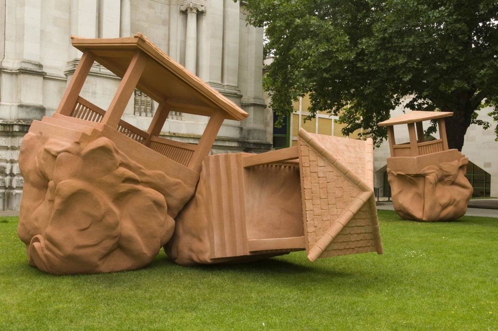 Christina Mackie, The Large Huts, 2007, steel, polystyrene, acrylic cement render, dimensions variable. Installation view, Art Now Sculpture Court, Tate Britain, London, UK