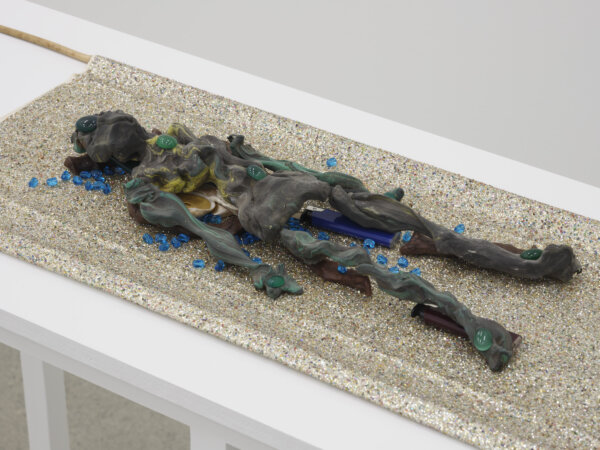Christina Mackie, Green Figure (detail), 2006, modeling clay, green onyx, lighters, wax, rope, paint in seashell, glass beads, fabric and bamboo, 36 x 12 in. (92 x 30 cm)
