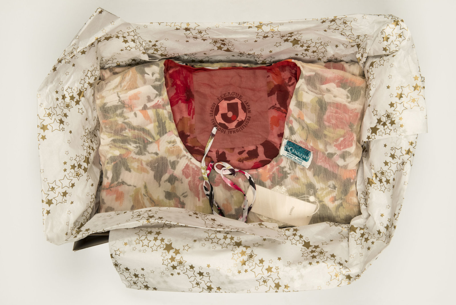 Liz Magor, Being This (J League Japan), 2012, paper, textiles, found materials, 12 x 19 x 3 in. (31 x 48 x 8 cm)