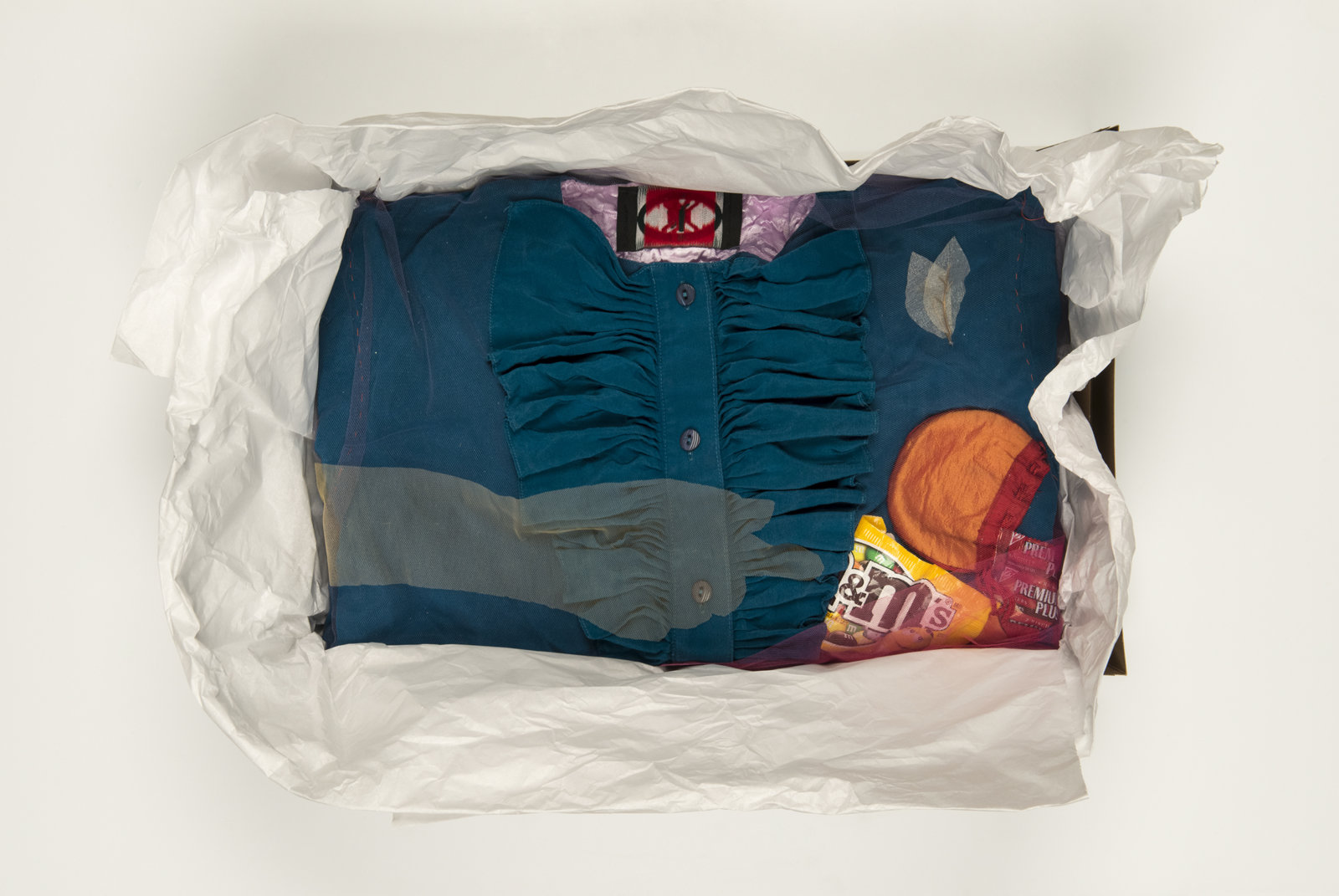 Liz Magor, Being This (M+M’s), 2012, paper, textiles, found materials, 11 x 17 x 3 in. (28 x 43 x 6 cm)