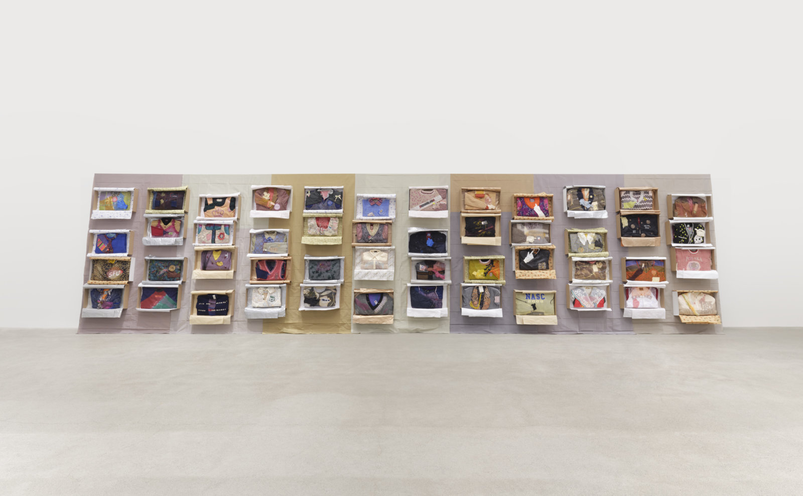 Liz Magor, Being This, 2012/2022, paper, textiles, found materials, 96 x 432 x 22 in. (244 x 1097 x 56 cm)