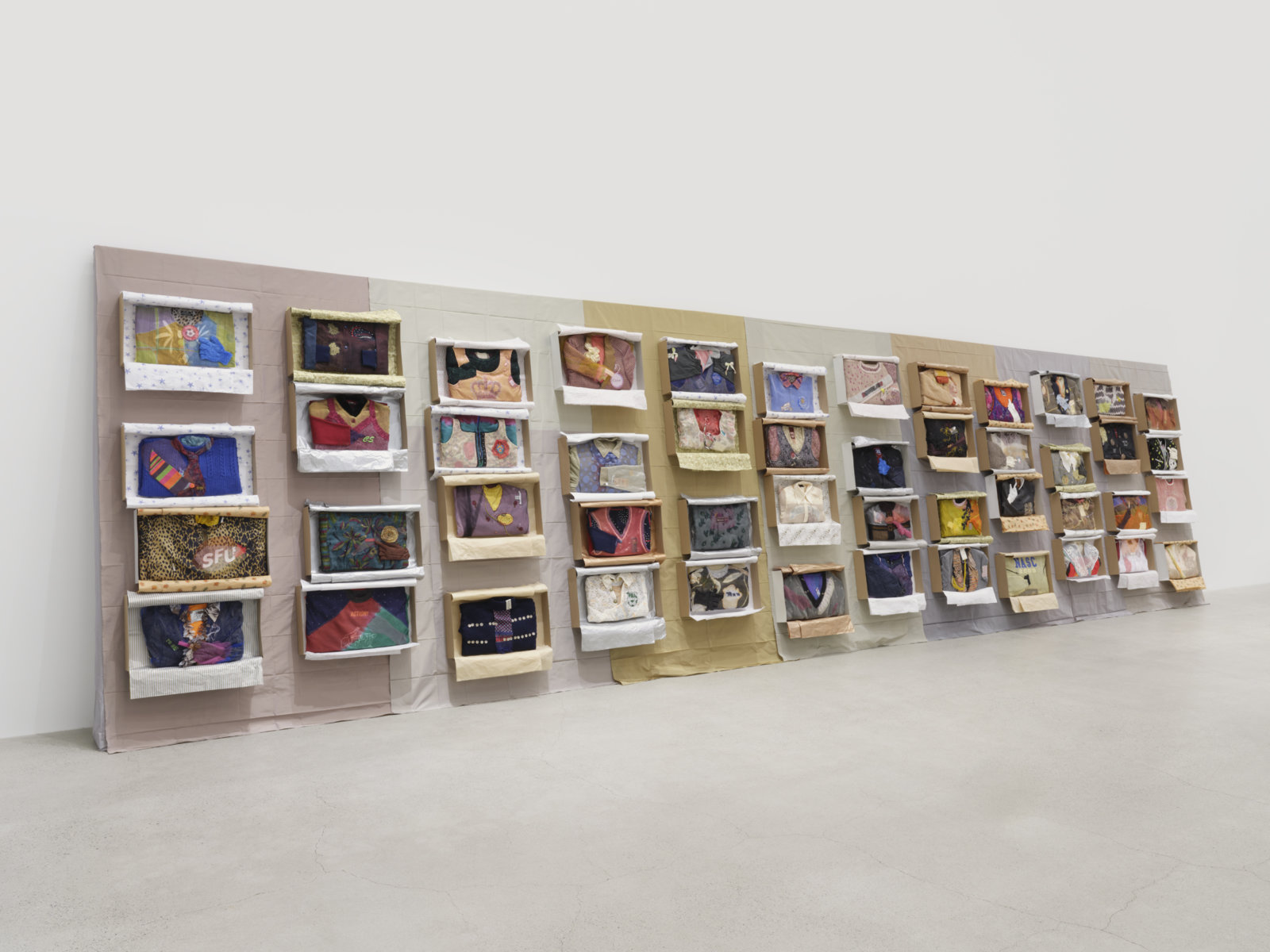 Liz Magor, Being This, 2012/2022, paper, textiles, found materials, 96 x 432 x 22 in. (244 x 1097 x 56 cm)