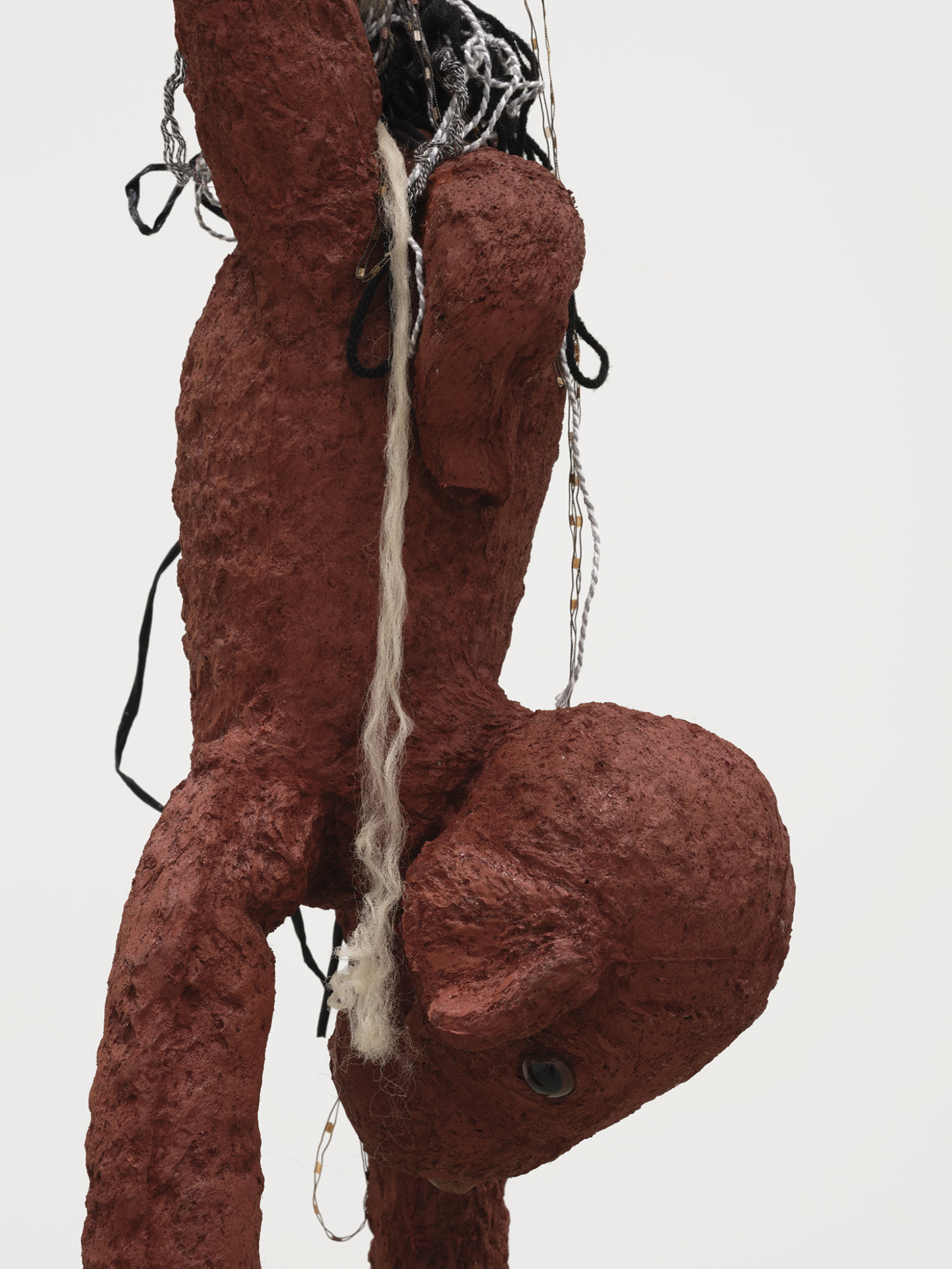 Liz Magor, Delivery (red) (detail), 2018, silicone rubber, textiles, twine, 325 x 26 x 23 in. (826 x 66 x 58 cm)