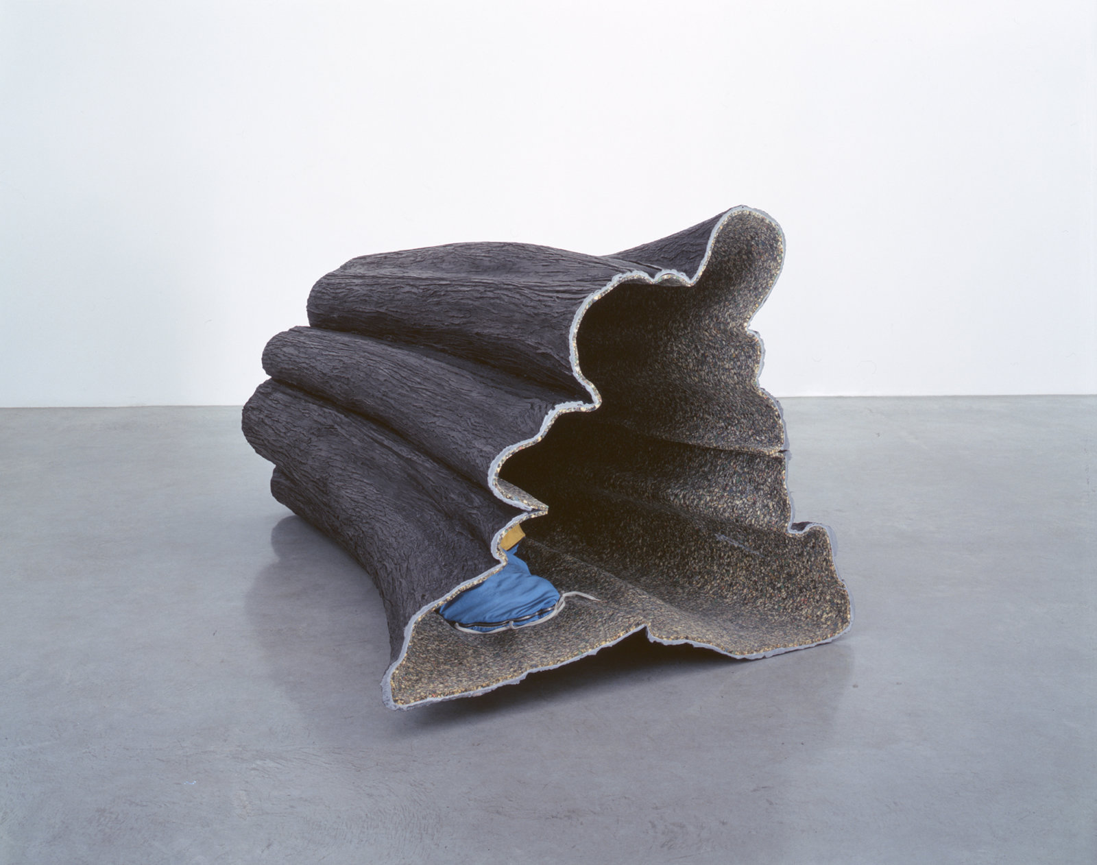 Liz Magor, Hollow, 1998–1999, polymerized gypsum, fabric, foam, 72 x 42 x 48 in. (183 x 107 x 122 cm)