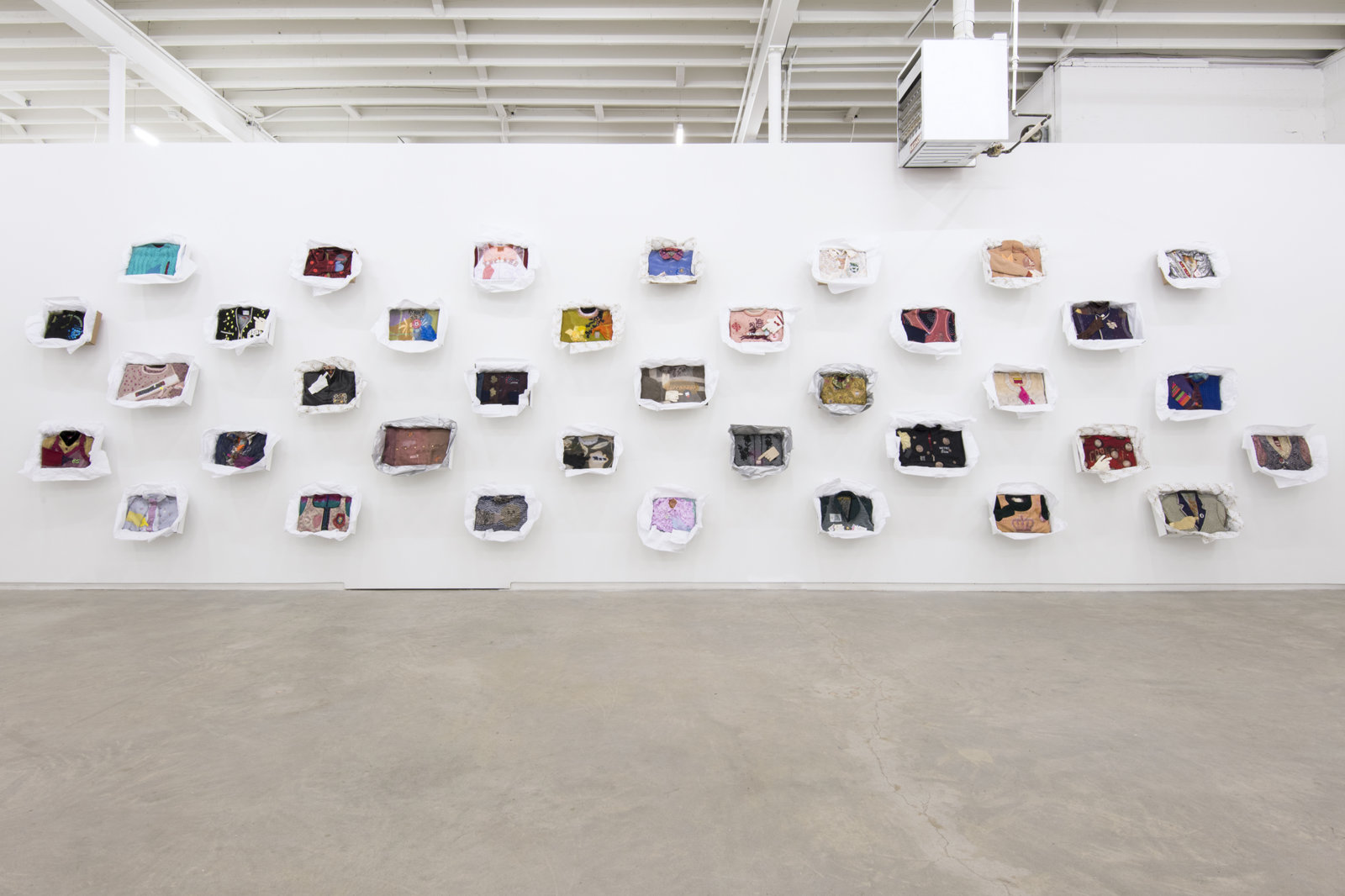 Liz Magor, Being This, 2012, 36 boxes, paper, textiles, found materials, each box approximately 12 x 19 x 3 in. (31 x 48 x 6 cm), installation dimensions variable