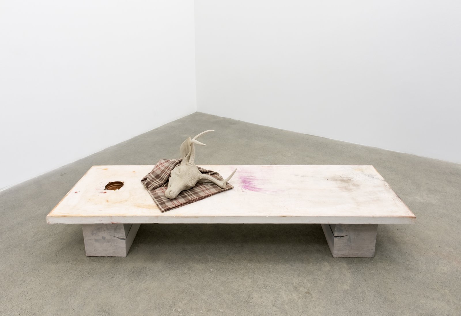 Liz Magor, Long Table (ashtray), 2006–2018, polymerized gypsum, cotton, 22 x 24 x 78 in. (56 x 61 x 198 cm)