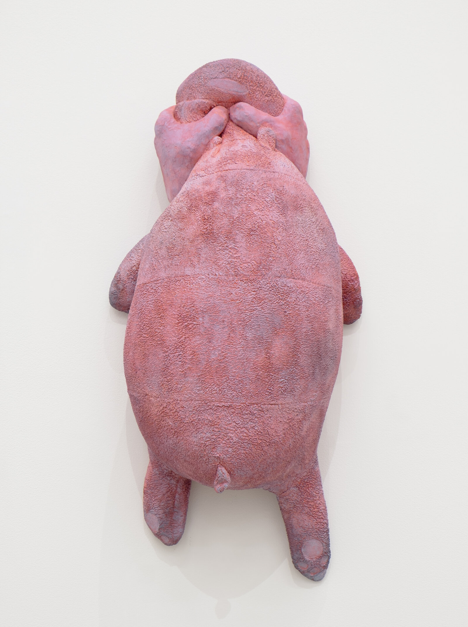 Liz Magor, PUNCH (fluorescent red), 2026, polymerized gypsum, 21 x 10 x 7 in. (53 x 26 x 17 cm)