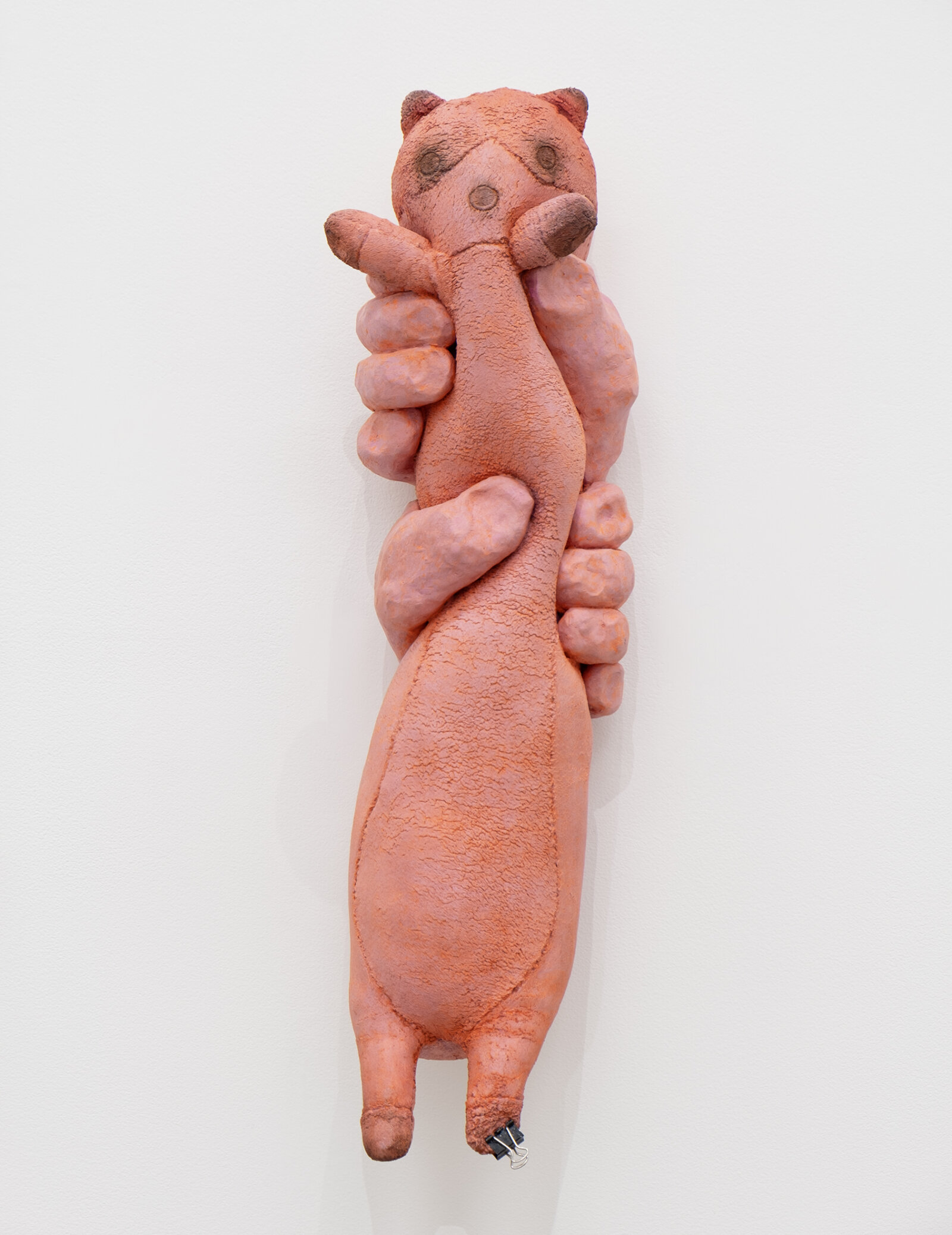 Liz Magor, PUNCH (quinacridone magenta), 2026, polymerized gypsum, metal clip, 19 x 6 x 5 in. (49 x 15 x 14 cm)