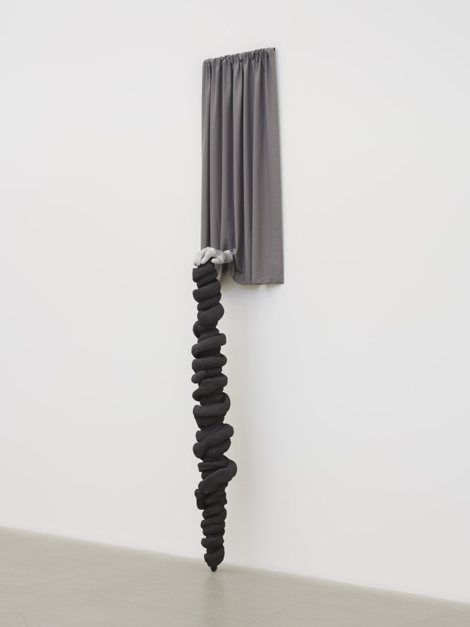 Liz Magor, Palm, 2025, textile, aluminum, polymerized gypsum, 120 x 17 x 31 in. (305 x 42 x 79 cm)