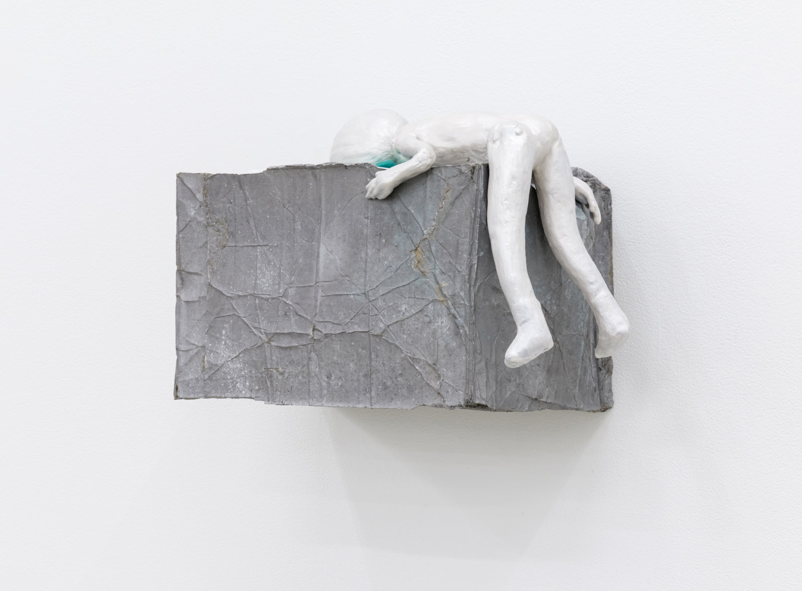 Liz Magor, Pearl Body, 2015, polymerized gypsum, plywood, textile and acrylic, 8 x 13 x 8 in. (20 x 32 x 20 cm)