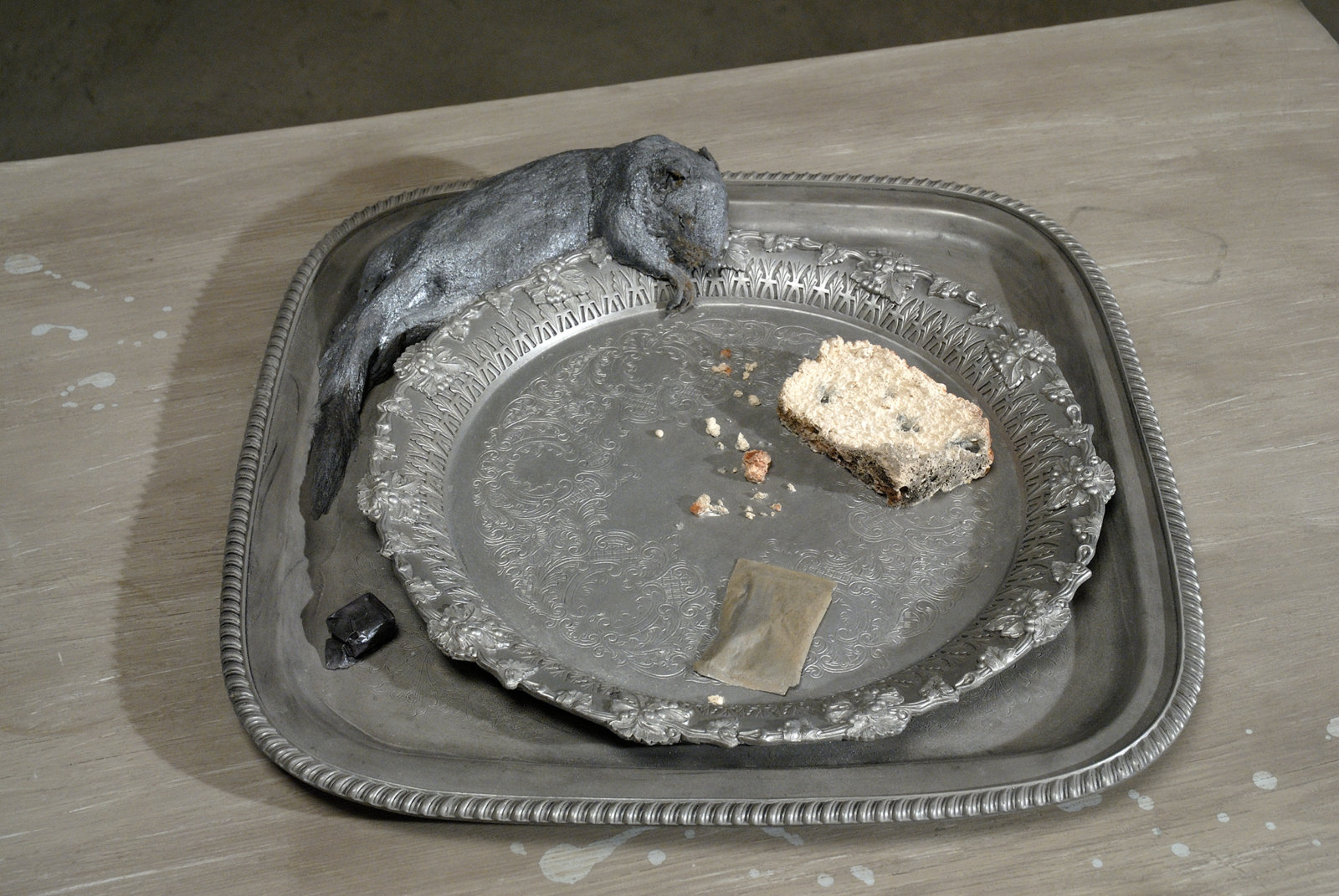 Liz Magor, Squirrel (cake), 2008, polymerized gypsum, 4 x 24 x 32 in. (10 x 60 x 80 cm)