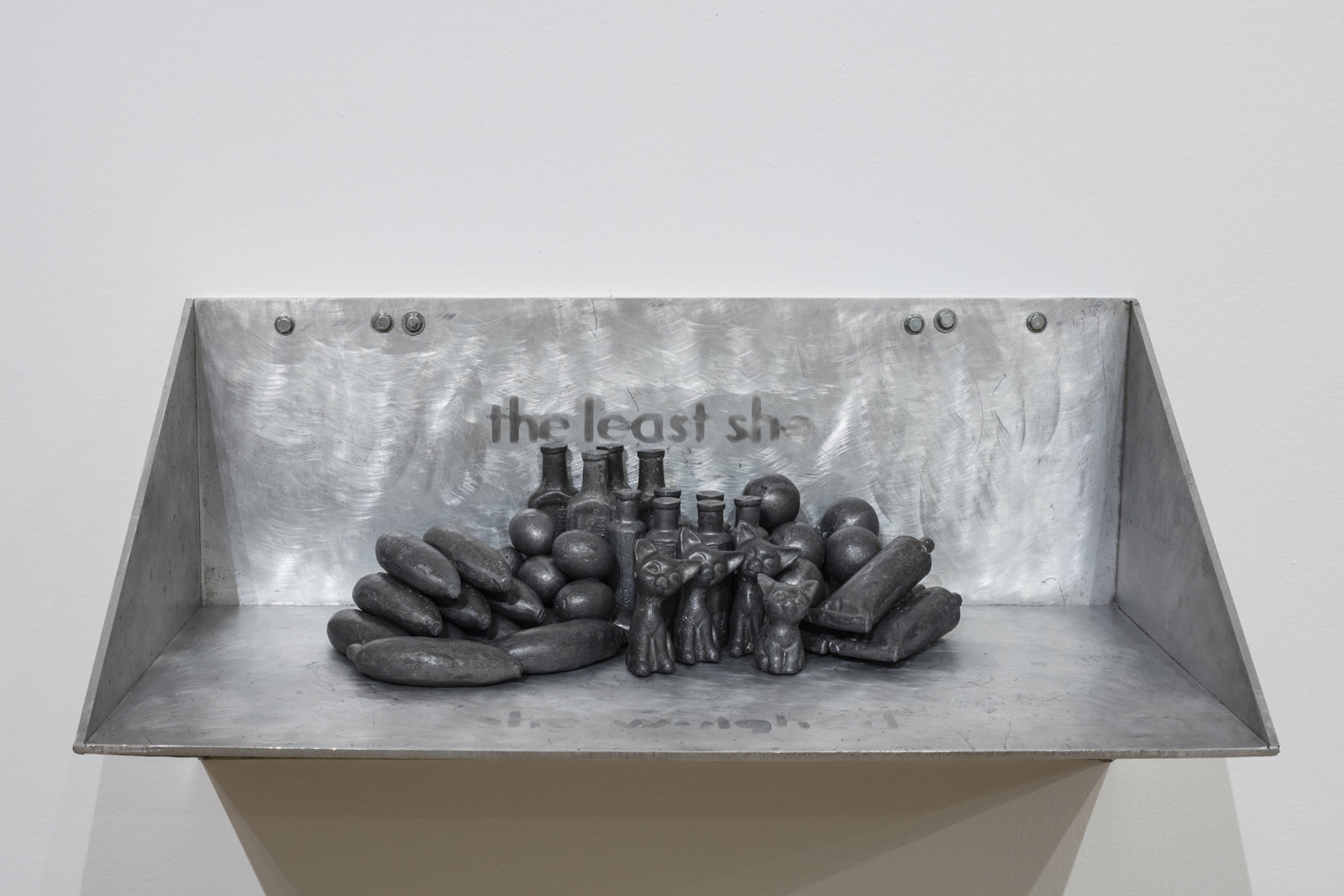 Liz Magor, The Most She Weighed / The Least She Weighed, 1982, lead, aluminum, 15 x 30 x 15 in. (38 x 77 x 38 cm), 12 x 24 x 12 in. (31 x 62 x 31 cm)