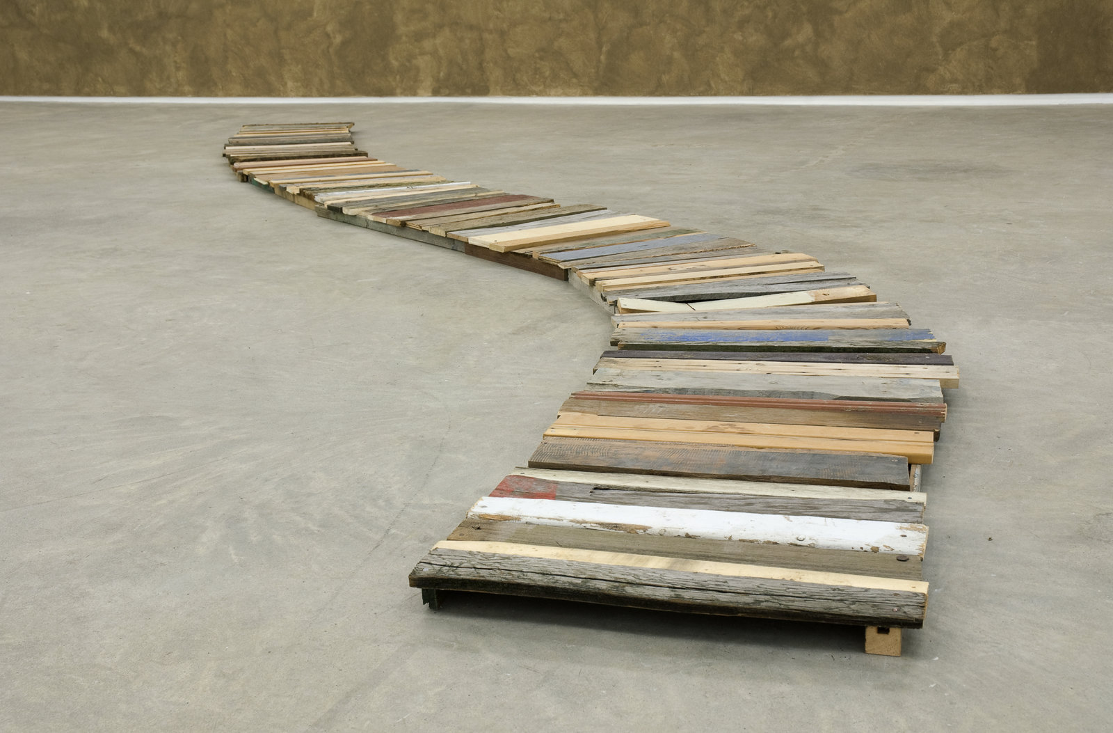 Ashes Withyman, A Most Elastic Road from Uncertain Pilgrimage, 2009, found wood, found nails, 276 x 44 x 3 in. (701 x 112 x 6 cm)