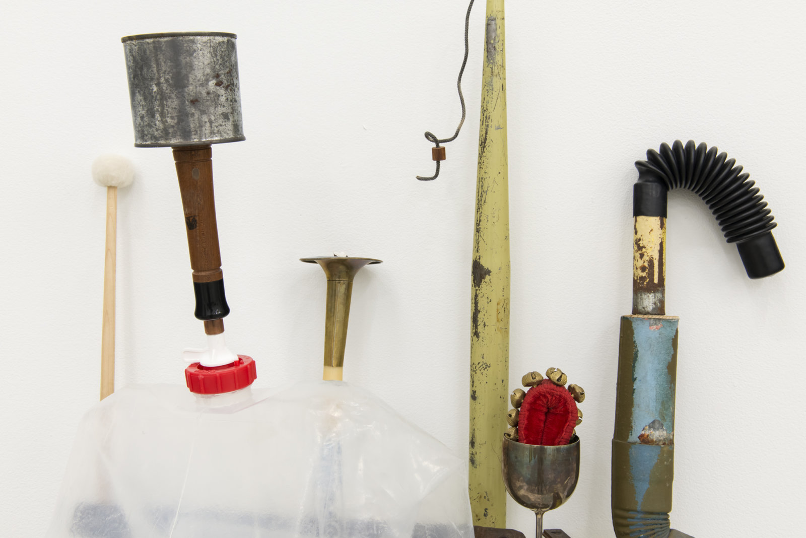 Ashes Withyman, Compass, Furnas, Altar, River, Cetus, Musca, Cup (detail), 2017–2018, water jug, sash weight, mallet, bells, brass horn, hunting call parts, drainpipe, chair leg, silver cup, marker, electrical parts, painted plywood, 29 x 25 x 12 in. (72 x 64 x 31 cm)