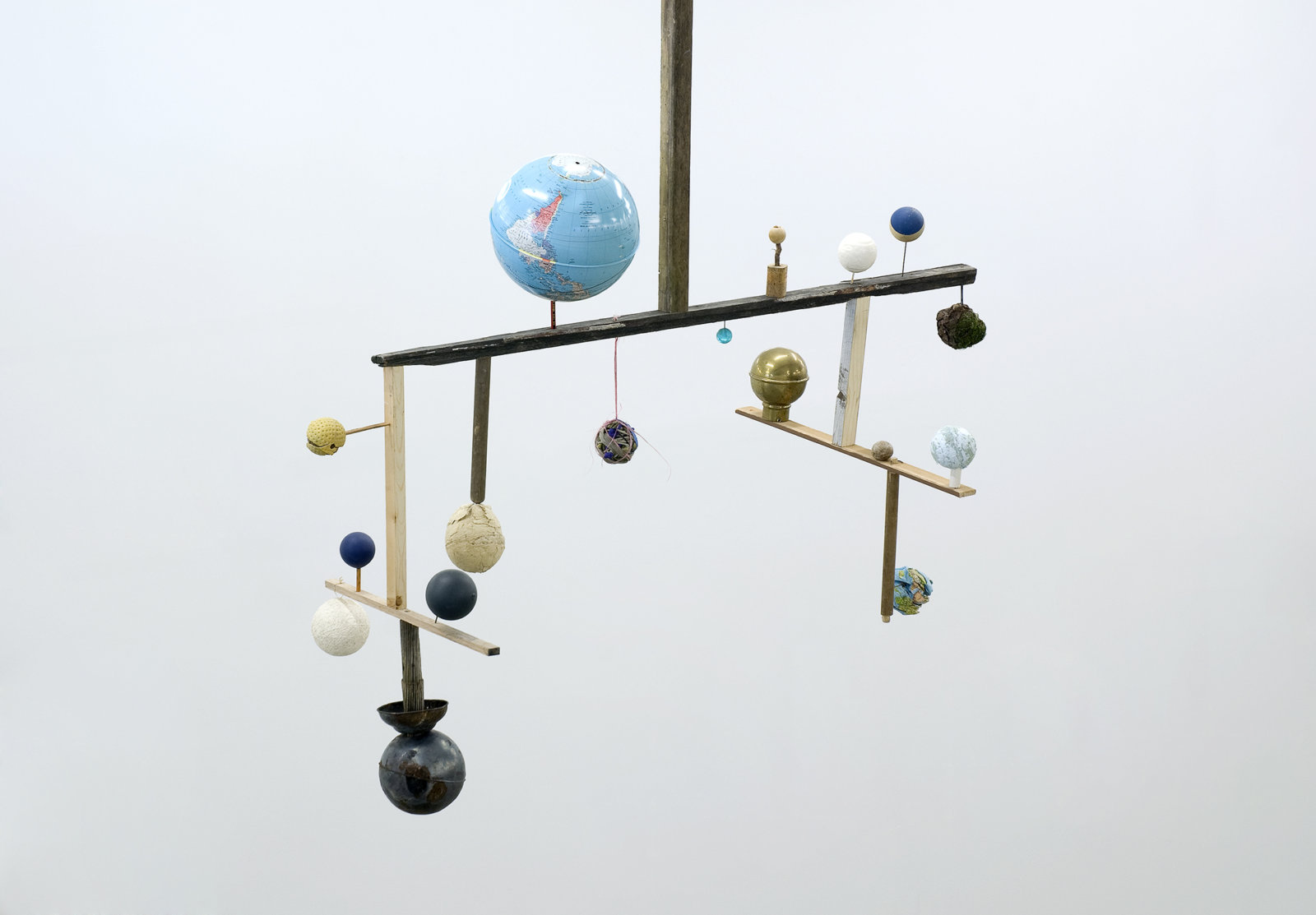 Ashes Withyman, Crown Compass (from Uncertain Pilgrimage), 2009, globes, balls, paint, scrap material, 103 x 22 x 54 in. (262 x 57 x 137 cm)