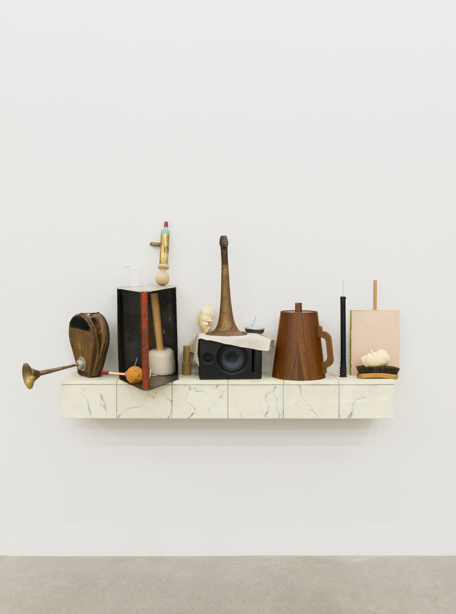 Ashes Withyman, Furnas, Compass, Altar, Musca, River, Cetus, Cup, 2017–2018, tool box, styrofoam cup, mallet, brass horn, bullae, mosquito repelling devices, shoe brush, paper, wood, brass, animal call parts, musical instrument parts, pump, speaker, painted plywood, 34 x 63 x 14 in. (86 x 160 x 34 cm)