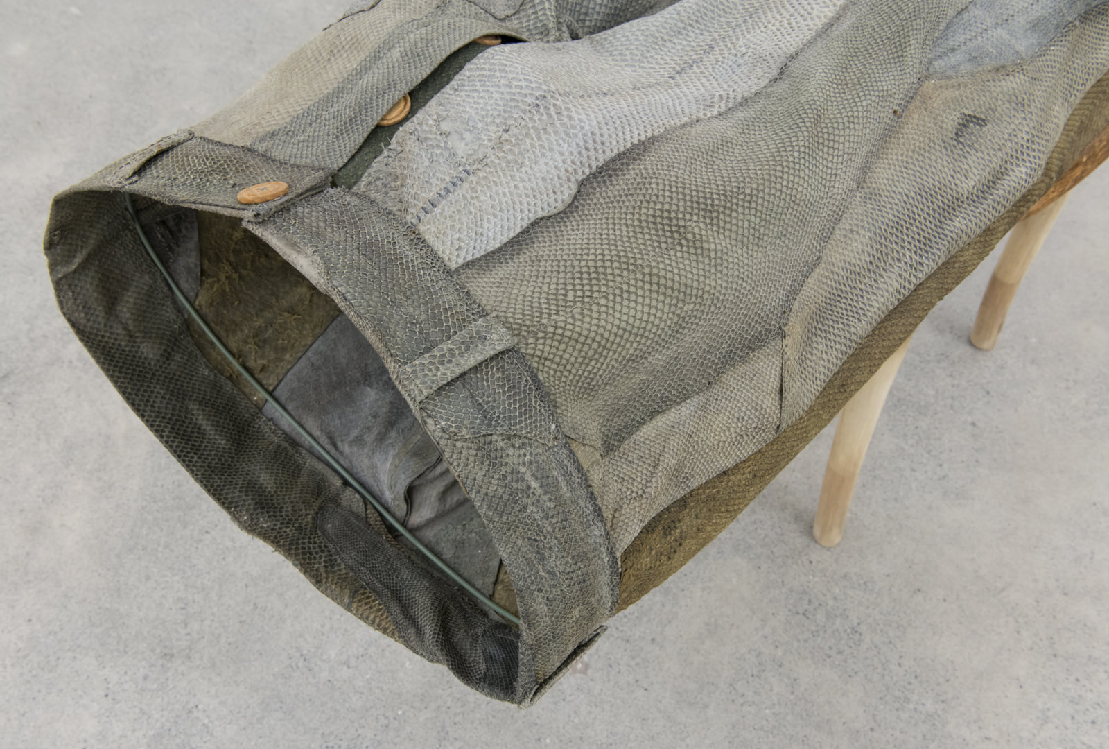 Ashes Withyman, Into the Water (In his Leather Breeches) (detail), 2008, fish leather, cotton thread, maple buttons, wooden chair, 28 x 35 x 15 in. (71 x 89 x 38 cm)
