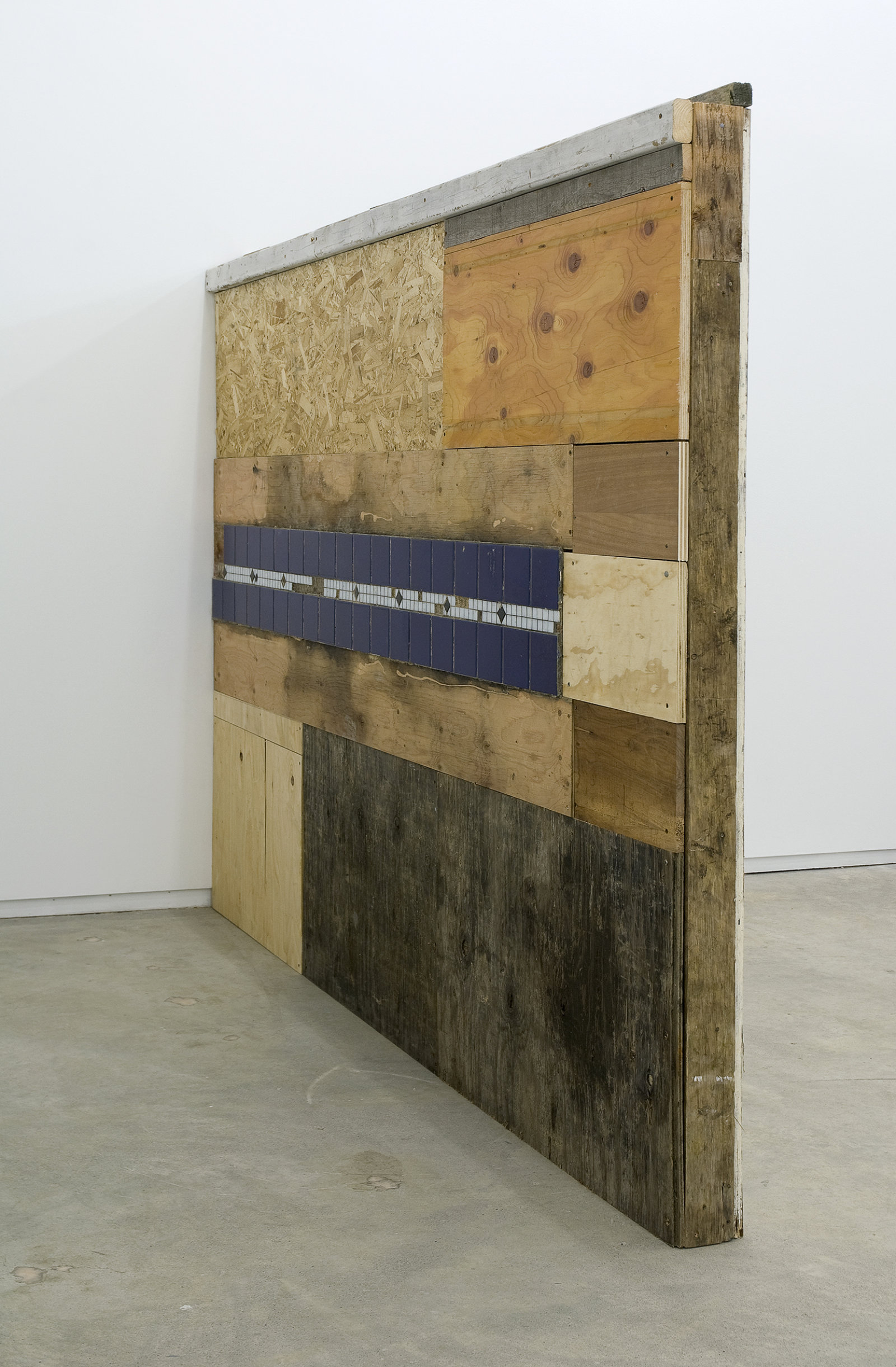Ashes Withyman, Piss Wall from Uncertain Pilgrimage, 2009, found wood, tile, 73 x 100 x 5 in. (186 x 253 x 13 cm) 