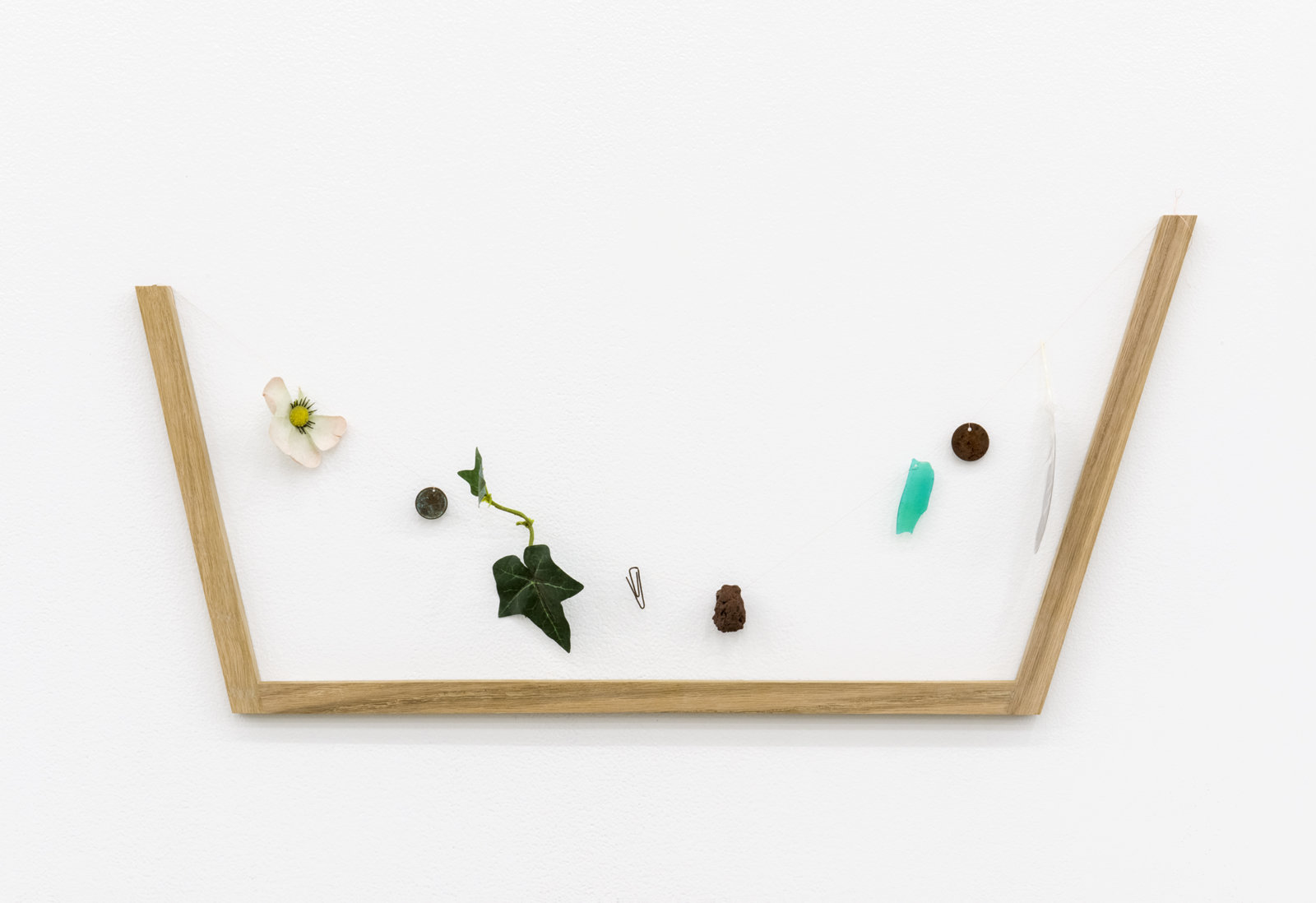 Ashes Withyman, Reminder (Anesidora), 2017, found materials, thread, wood, 12 x 24 x 1 in. (29 x 62 x 3 cm)