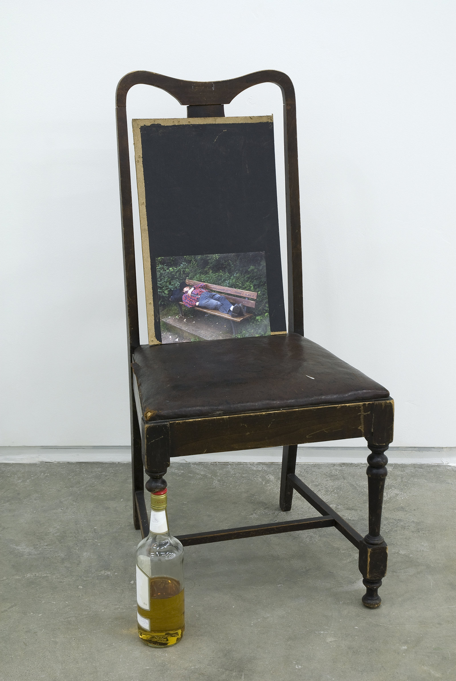 Ashes Withyman, Untitled from Uncertain Pilgrimage, 2009, broken chair, whiskey, paint, wood, ‘Friend in Theatre, Asleep’ lightjet print, 40 x 19 x 18 in. (102 x 47 x 44 cm)