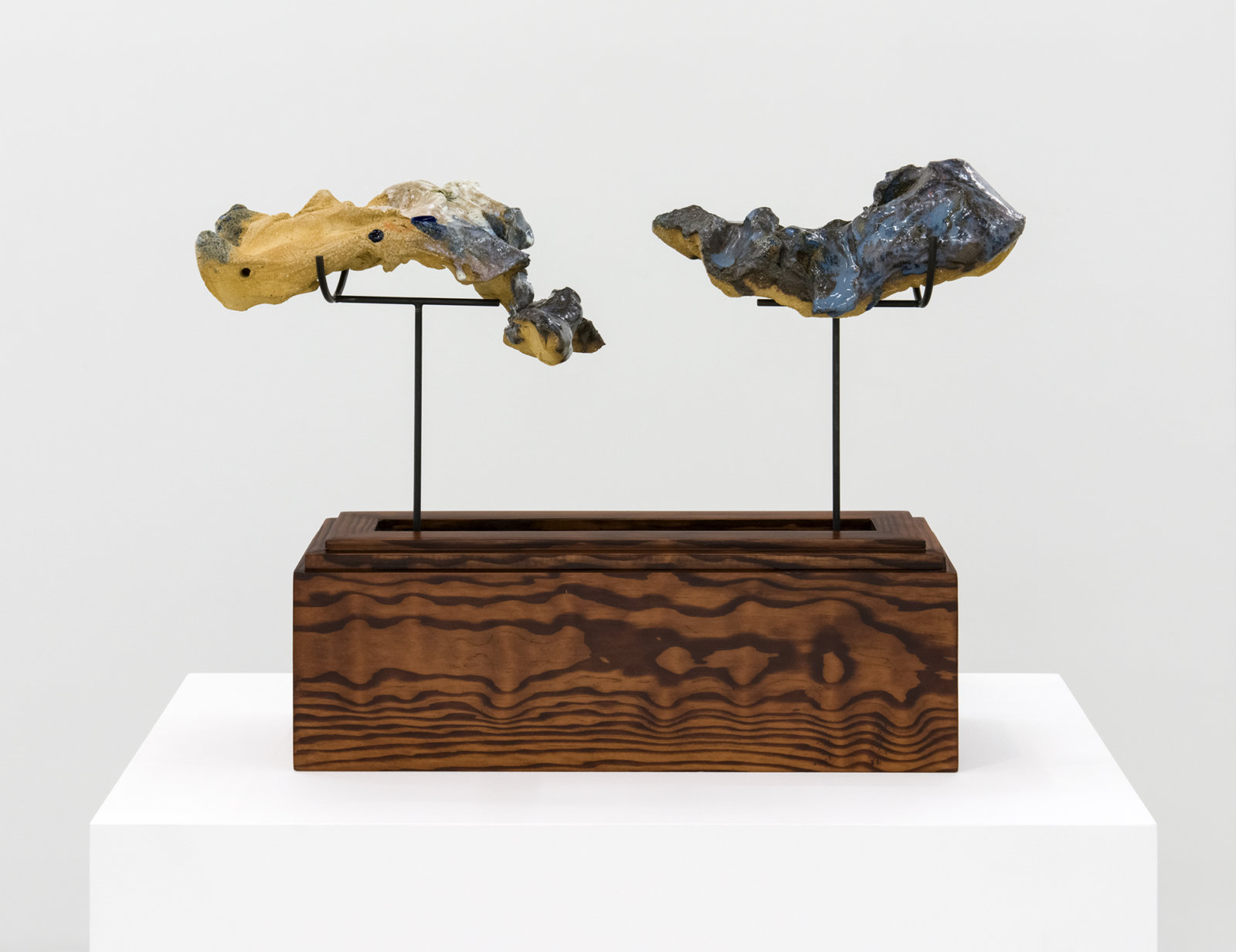 Damian Moppett, Figure in Two, 2016, glazed stoneware, wood, steel, 15 x 20 x 6 in. (39 x 51 x 16 cm)