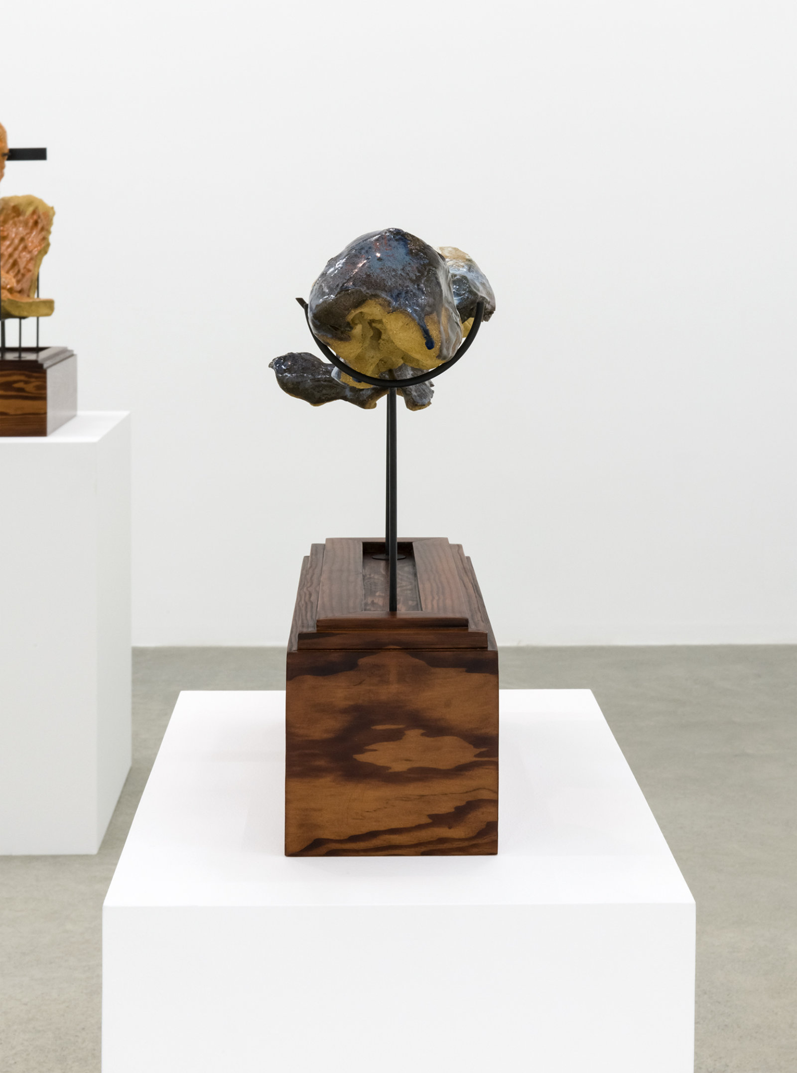 Damian Moppett, Figure in Two, 2016, glazed stoneware, wood, steel, 15 x 20 x 6 in. (39 x 51 x 16 cm)