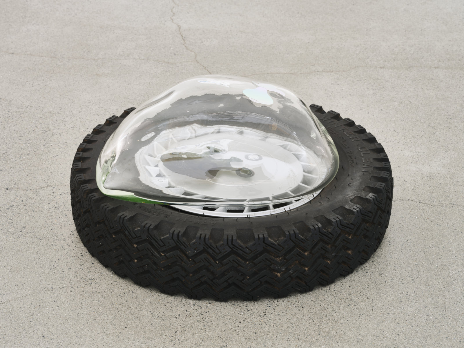 Jerry Pethick, Aerial View (detail), 2001–2002, tires, spectrafoil cut-outs, black silicone, blown glass, dimensions variable