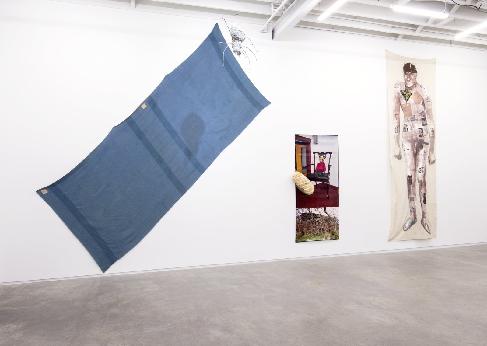 Jerry Pethick, Bigger than a book, Wilder than a Tree, 1994–1997, found book Irish Giant, paint, graphite on linen, styrofoam, cibachrome photograph, wool blanket, spotlight, papier-mâché, metal spider, dimensions variable
