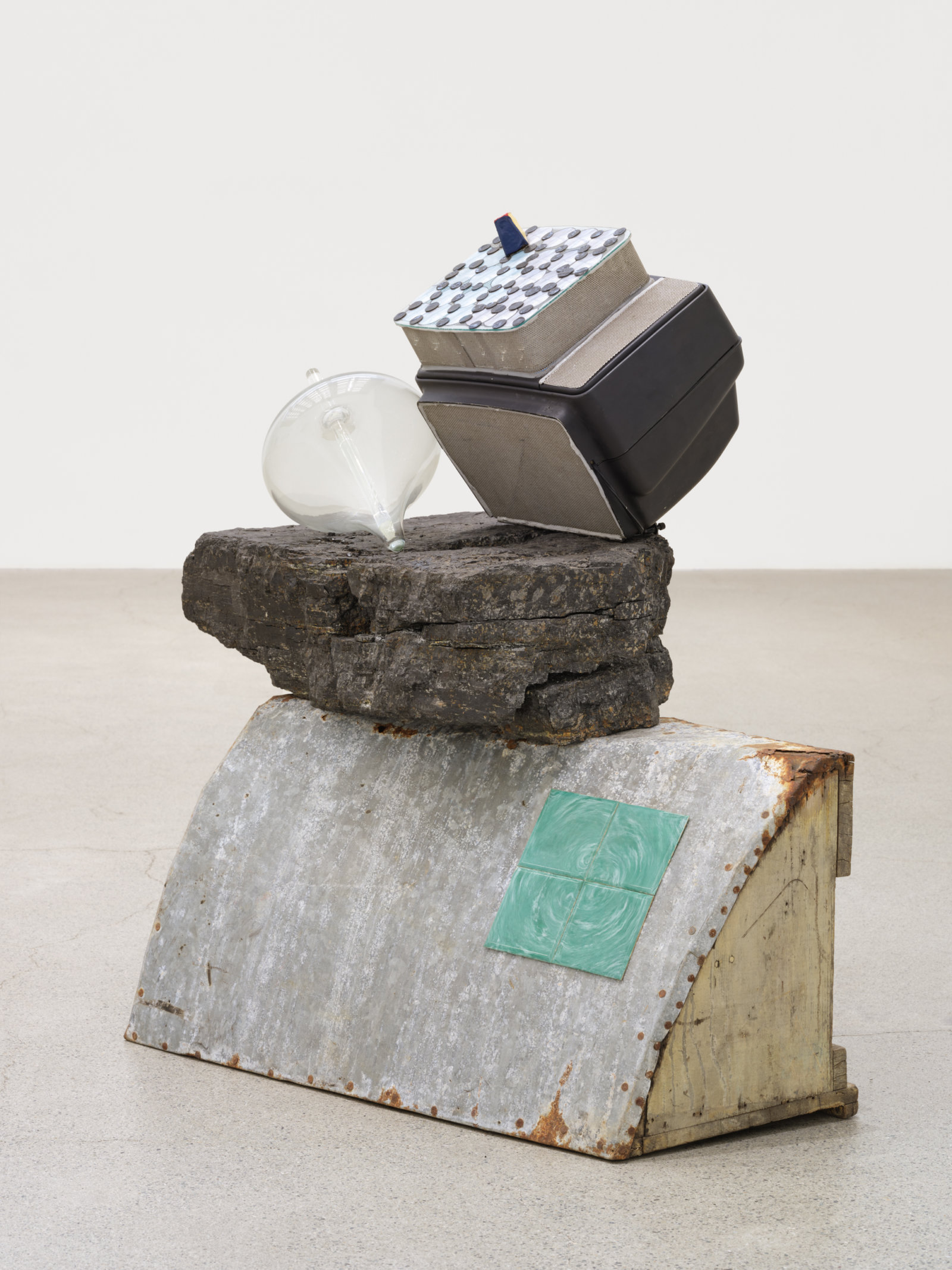 Jerry Pethick, Floating Free, 1972–1993, wood, galvanized metal, plastic, coal, TV, duratrans, blown glass, lenses, aluminum, tiles, silicone, 43 x 27 x 42 in. (109 x 67 x 105 cm)