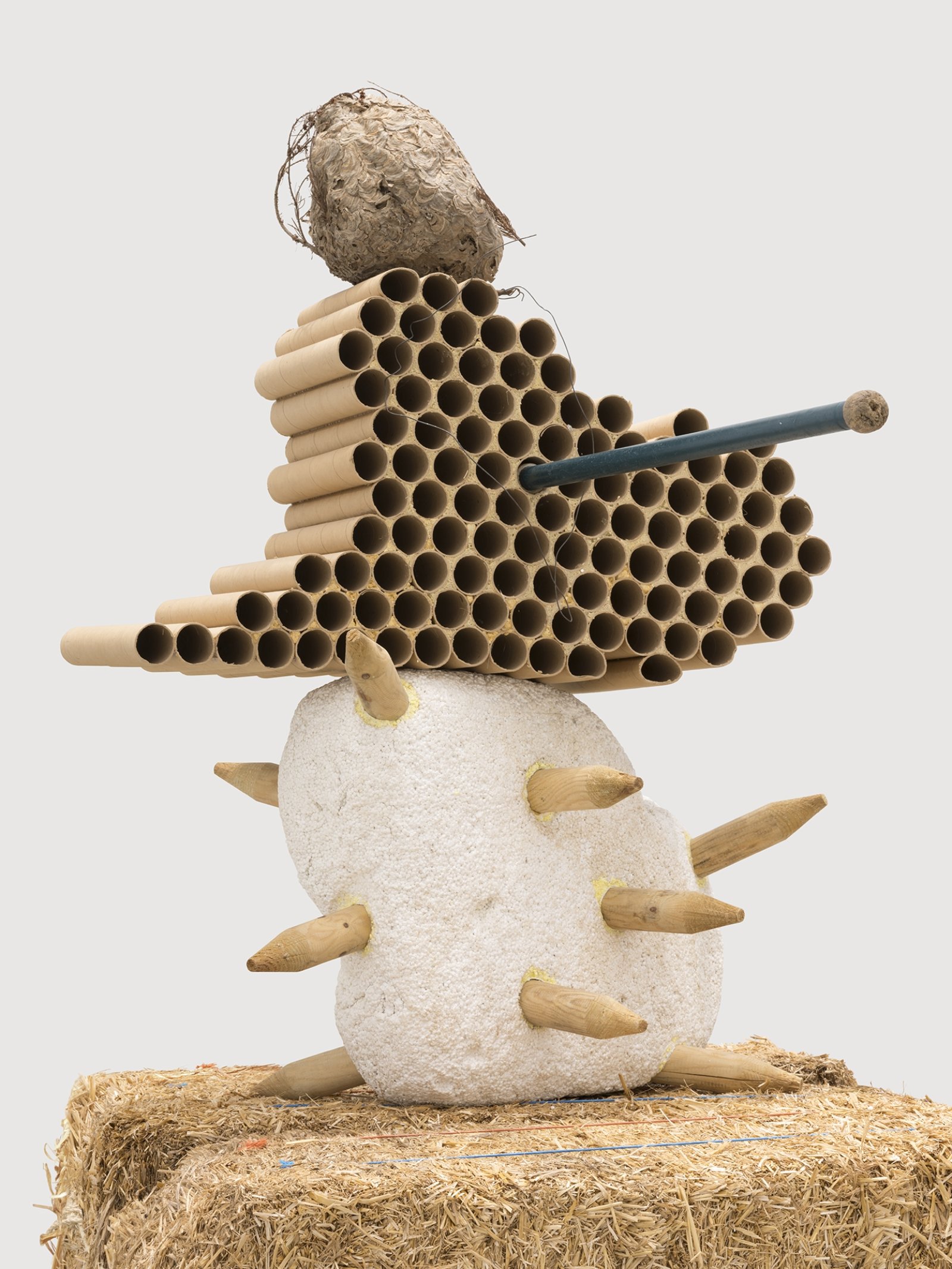 Jerry Pethick, Gobi Clone (detail), 1996/1997, straw bales, styrofoam, wood, cardboard, hornet’s nest, anodized aluminum, polypropylene rope, cloth, orange rubber, iron wire, sulphur, dried fir needles, 107 x 55 x 46 in. (272 x 140 x 117 cm)