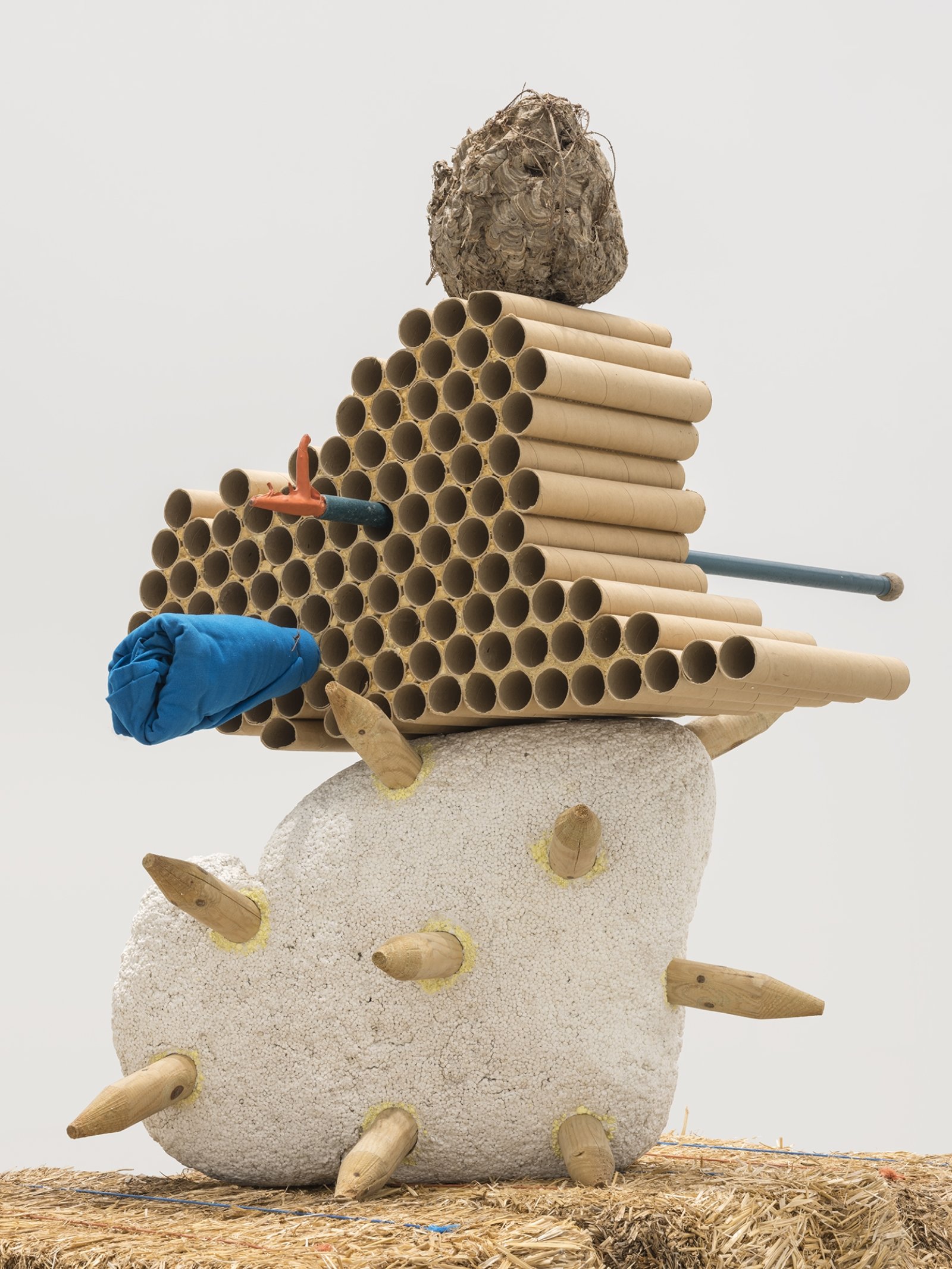 Jerry Pethick, Gobi Clone (detail), 1996/1997, straw bales, styrofoam, wood, cardboard, hornet’s nest, anodized aluminum, polypropylene rope, cloth, orange rubber, iron wire, sulphur, dried fir needles, 107 x 55 x 46 in. (272 x 140 x 117 cm)