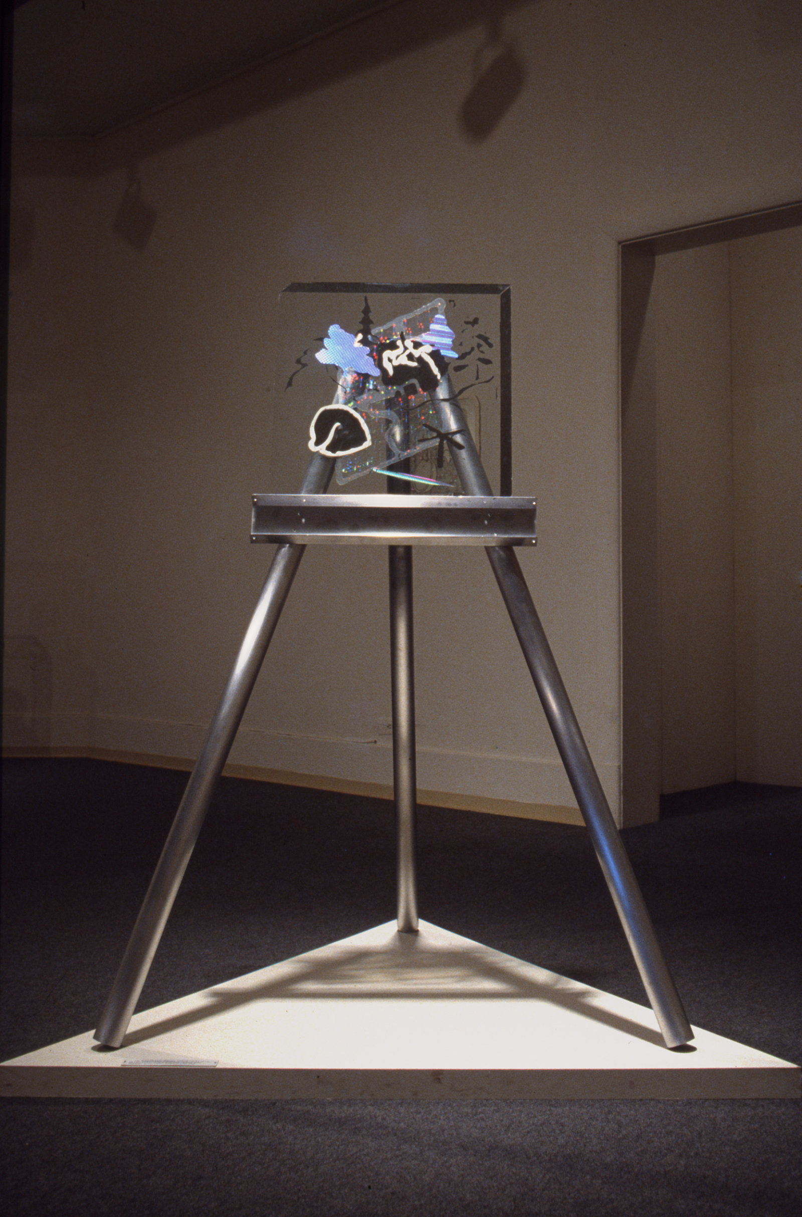 Jerry Pethick, Krieghoff Easel (Signed), 1978–1979, etched mirror, diffraction grating, glass, aluminum, silicone sealant, 56 x 28 x 28 in. (142 x 79 x 79 cm)