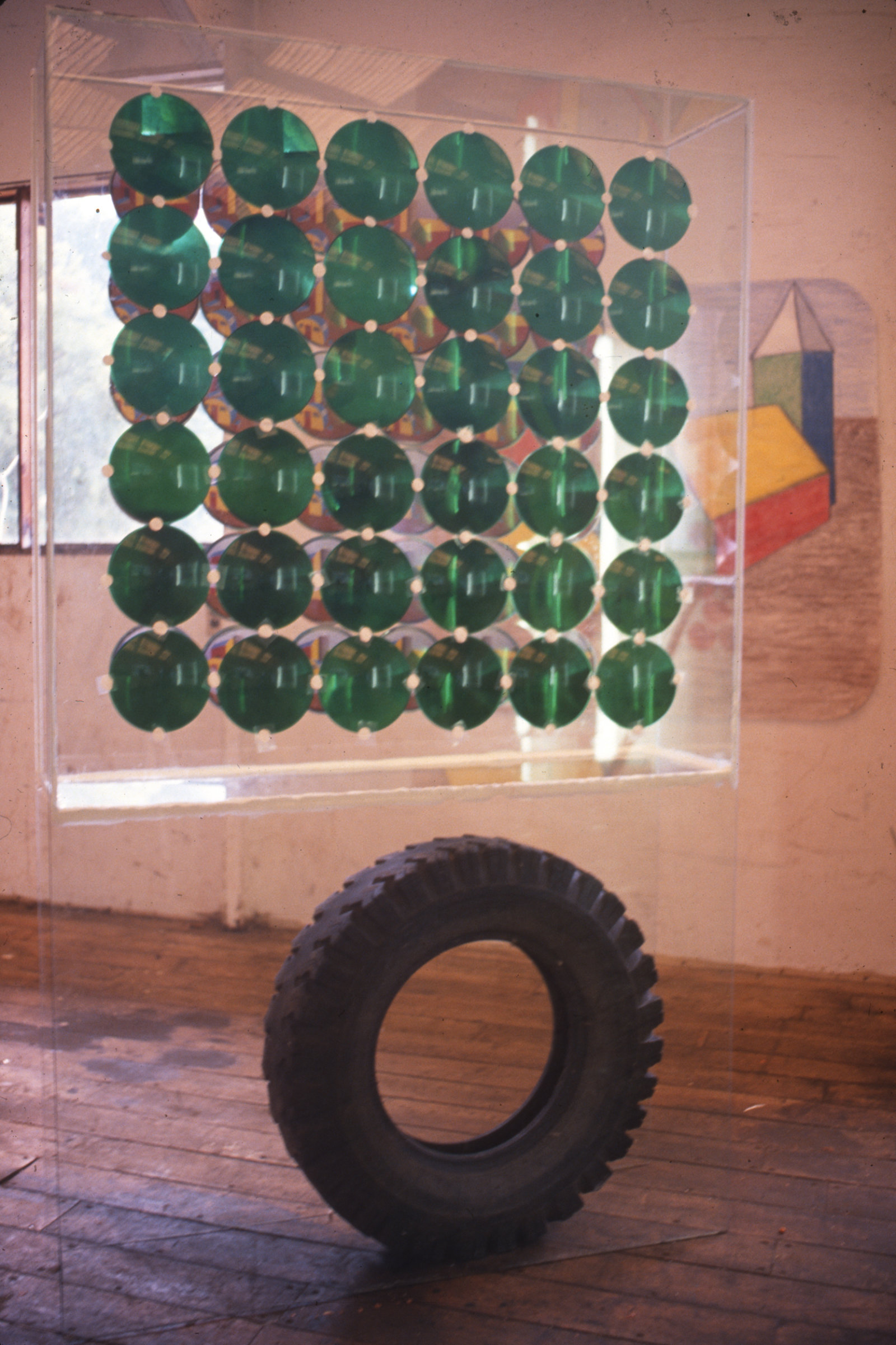 Jerry Pethick, Let Sleeping Dogs Lie—The Dog’s Dream, 1988–1989, cardboard tubes, colour coded drawing, carpet and photo array, dimensions variable