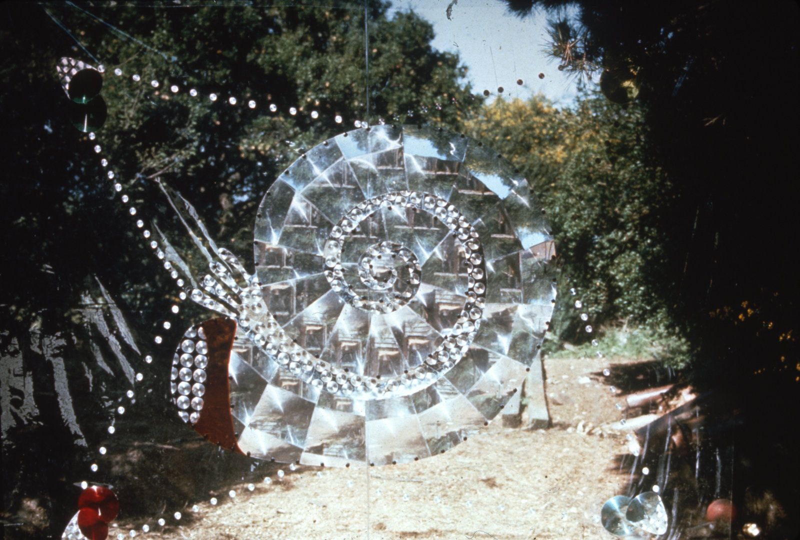 Jerry Pethick, Nautlilus, 1974, vinyl, fresnel lens, plastic rivets, diffraction grating, 107 x 48 in. (274 x 122 cm)