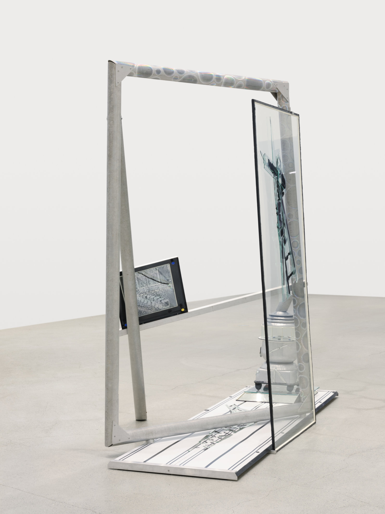 Jerry Pethick, One Side of Seurat, 1983, enamelled steel, aluminum, mirror, glass, silicone seal, etched spectrafoil, enamelled copper, 86 x 95 1/2 x 45 in. (218 x 243 x 114 cm)