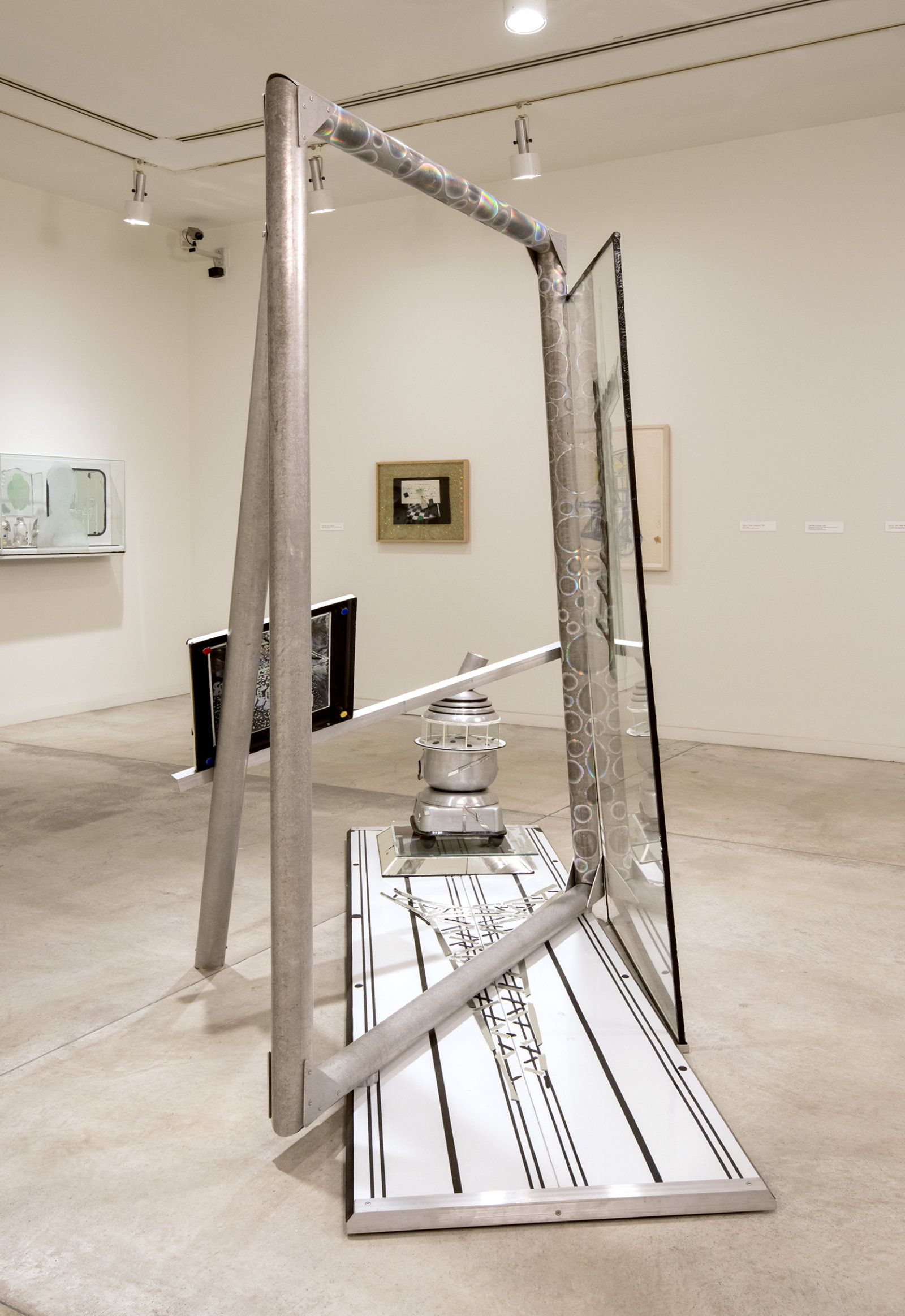 Jerry Pethick, One Side of Seurat, 1983, enamelled steel, aluminum, mirror, glass, silicone seal, etched spectrafoil, enamelled copper, 95 x 118 x 33 in. (240 x 300 x 84 cm)