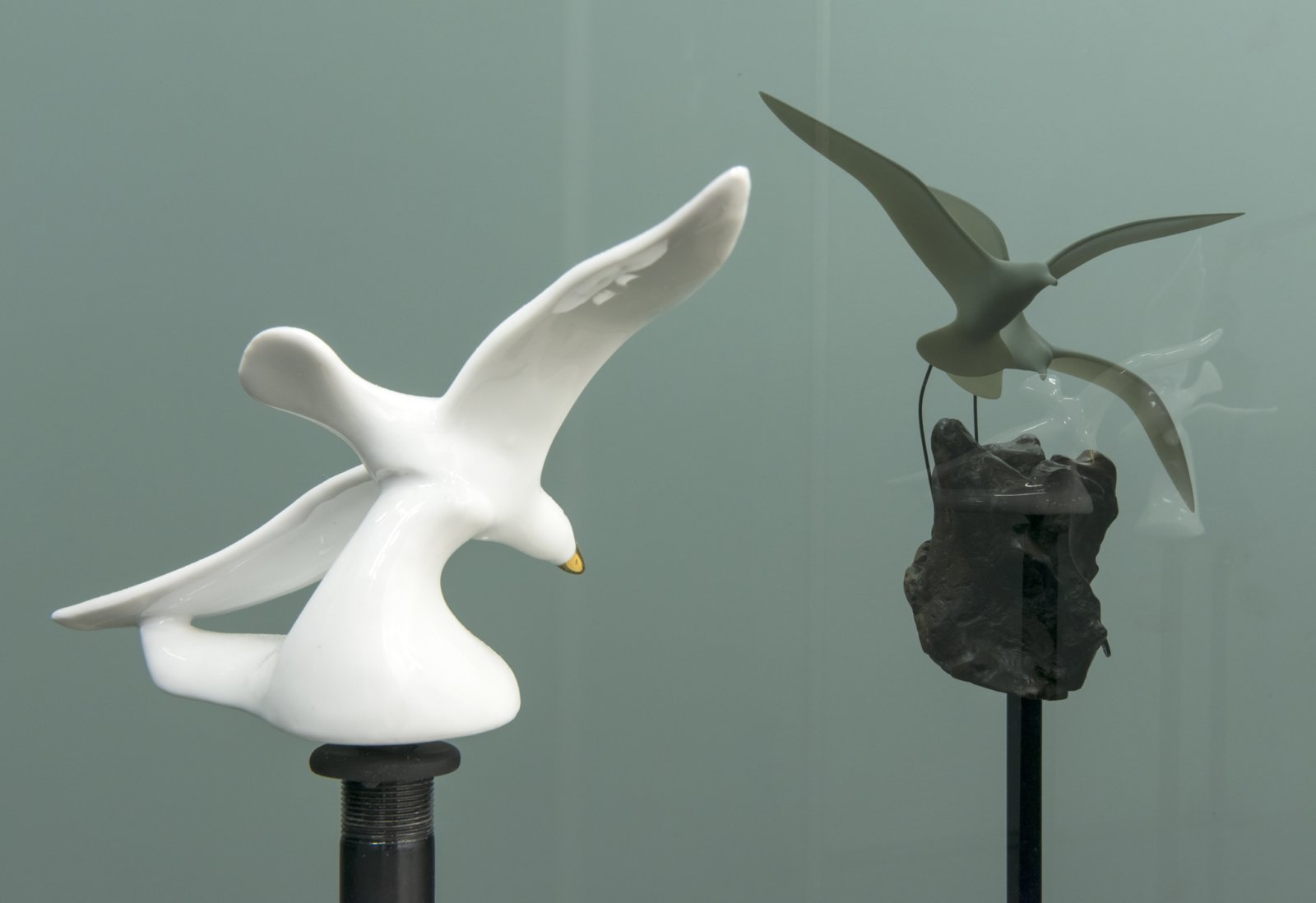 Judy Radul, Connector Divider (Hawks, Sparrows, Pigeons, Doves, Ducks, Eagles) (detail), 2018, salvaged glass, aluminum, found ceramic figurines, microphone stands, 82 x 96 x 231 in. (207 x 244 x 587 cm)
