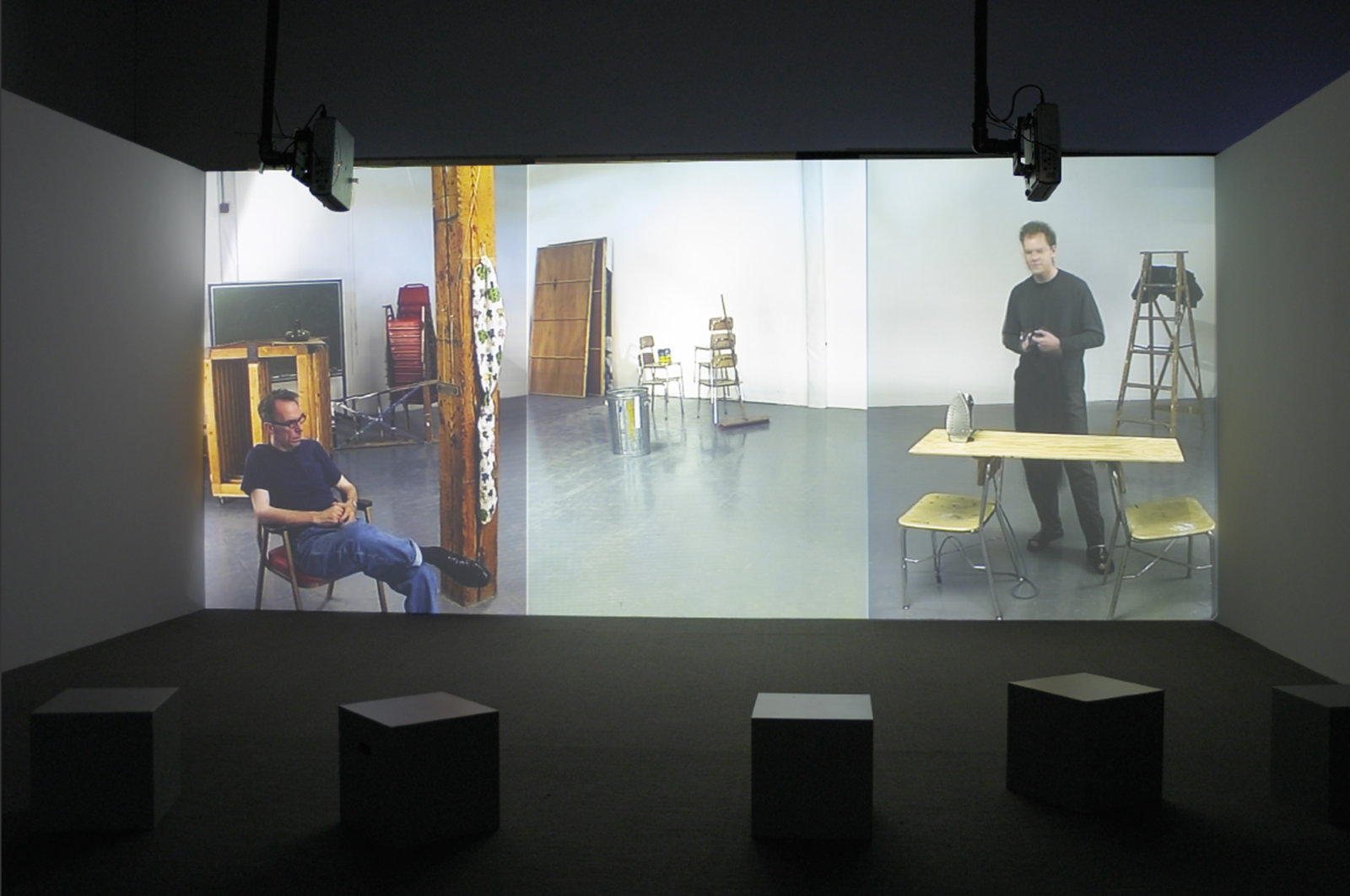 Judy Radul, Empathy with the Victor, 2001–2003, 3 channel projection, front projection: 16 minutes, 32 seconds, left projection: 12 minutes, 57 seconds, right projection: 41 minutes, 52 seconds