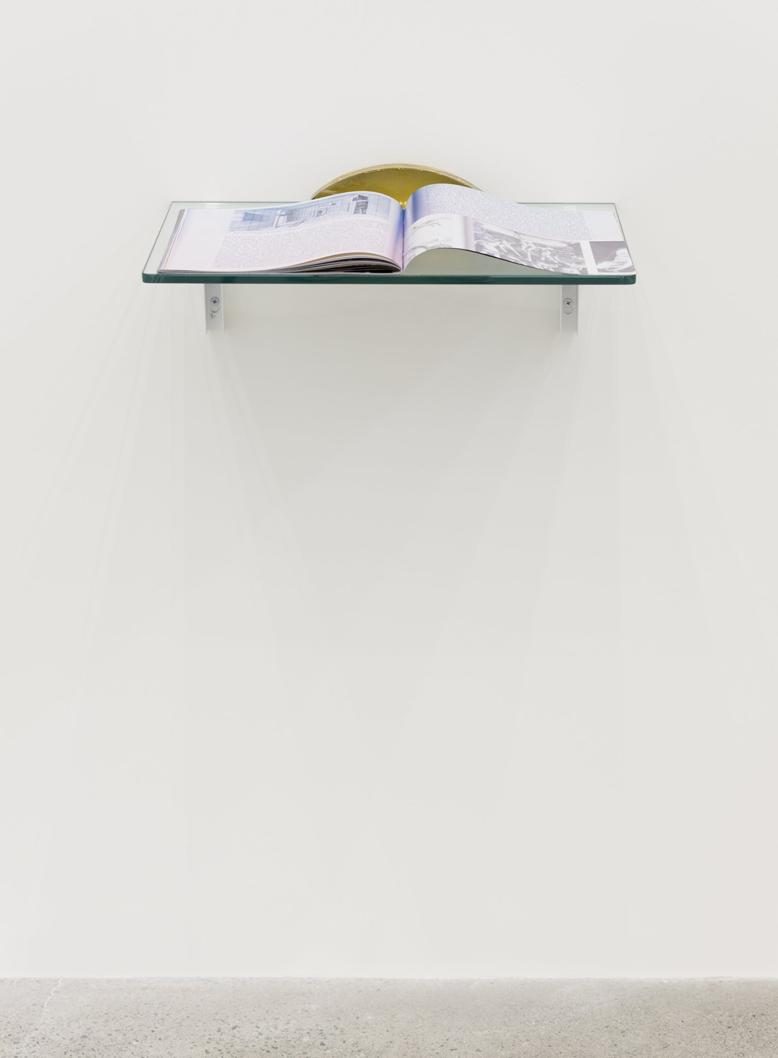 Judy Radul, Kings Never Touch Doors (detail), 2017–2019, fabric panels, pressed glass, “Dedicated to Swinging Thoughts” artist’s magazine, glass shelf, dimensions variable