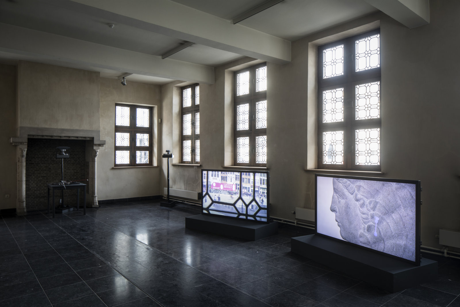 Judy Radul, The Book of Glass, 2017, multimedia installation, live cameras (HD teleconferencing cameras) with custom control system for camera choreography recording and playback, dimensions variable. Installation view, Planetary Records: Performing Justice Between Art and Law, Contour Biennale 8: Polyphonic Worlds: Justice as Medium, Mechelen, Belgium, 2017