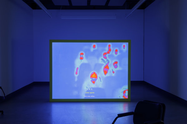 Judy Radul, Warmer Than The World Around Us, 2023, video projection of thermographic recording, PVC screen, painted wood and MDF, 34 minutes, 15 seconds, 73 x 95 x 12 in. (184 x 241 x 30 cm)﻿