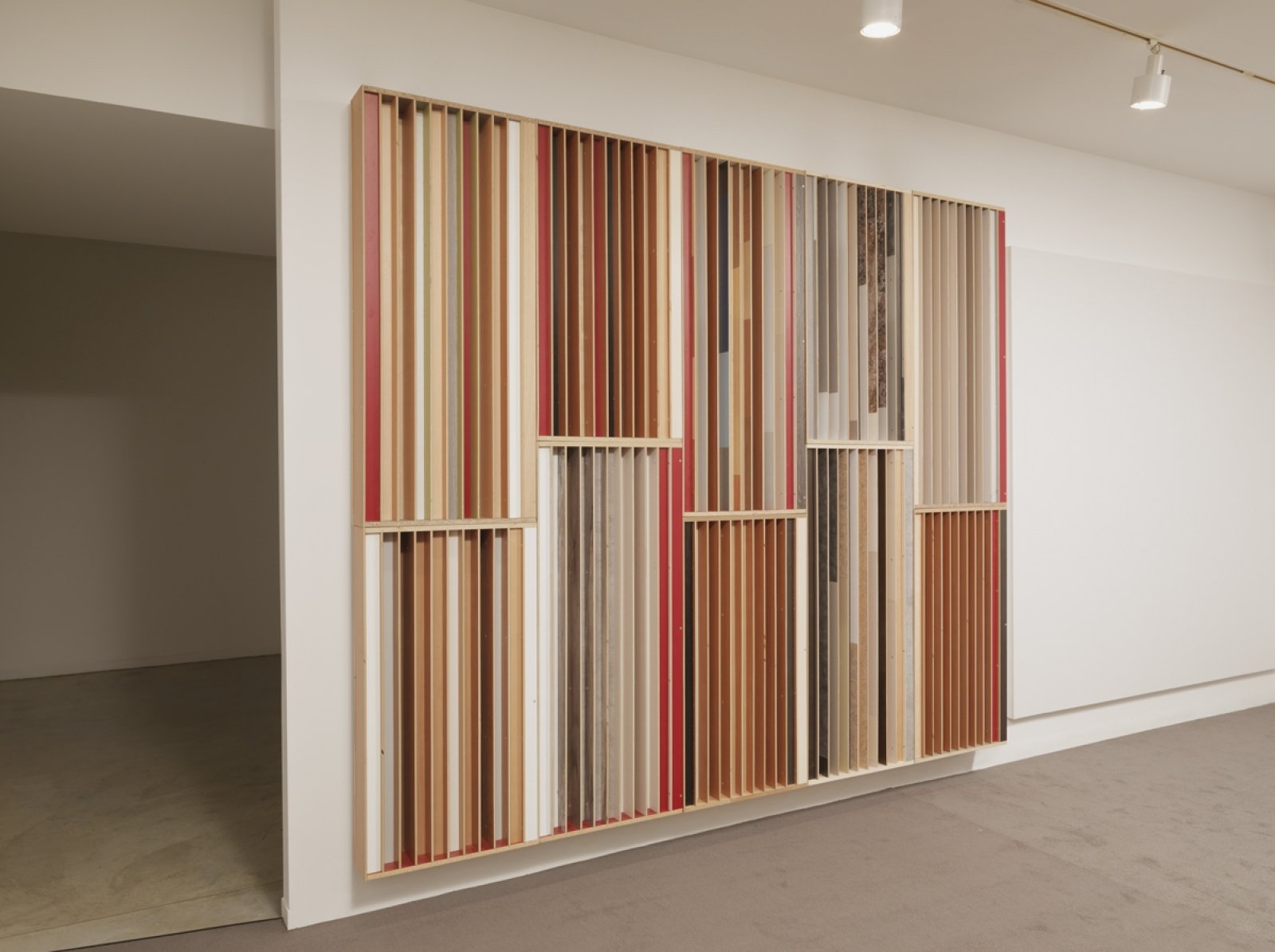 Kevin Schmidt, Excess Dispersion #1, 2018, kitchen cabinet and countertop offcuts, waste mdf laminate, 3 groups of 40 panels, dimensions variable. Installation view, We Are the Robots, Vancouver Art Gallery, Vancouver, 2018