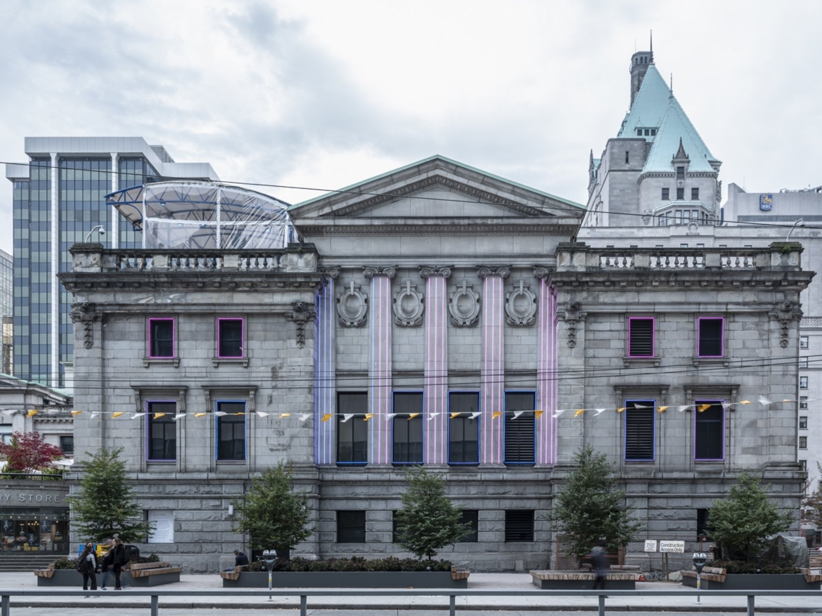 Kevin Schmidt, RGB Beg Cycle, 2018, styrofoam model of vancouver art gallery with led lights, dmx controllers, customized recording software, midi keyboards, electronics, computer, audio broadcast over radio, led lighting on exterior of gallery, dimensions variable. Installation view, We Are the Robots, Vancouver Art Gallery, Vancouver, 2018