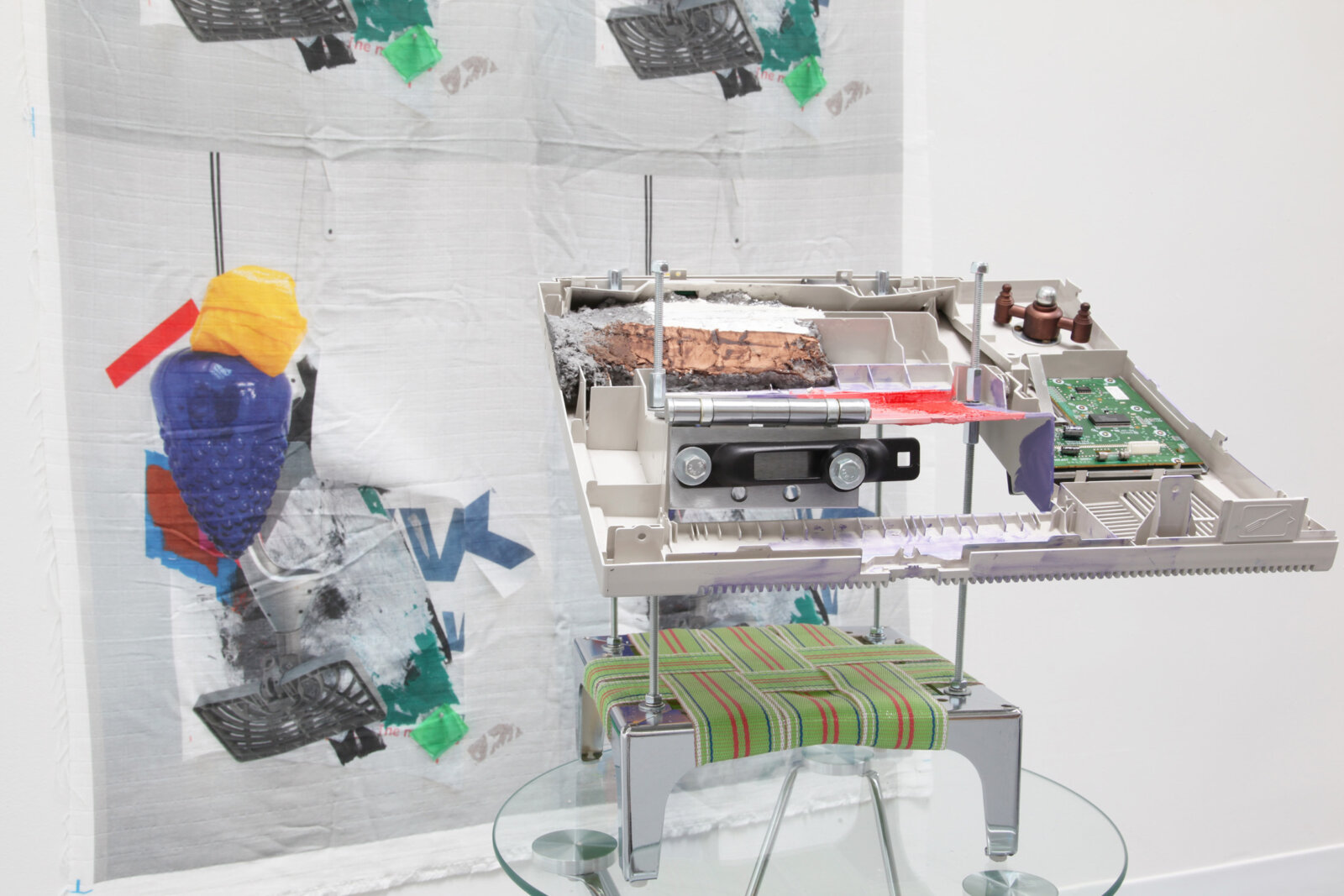 Jessica Stockholder, Behind the wallpaper (detail), 2020, plastic printer part, hardware, paper maché, acrylic and oil paint, nylon webbing, metal base, photo printed on fabric, 16 x 17 x 17 in. (41 x 43 x 42 cm), 62 x 39 in. (158 x 99 cm)