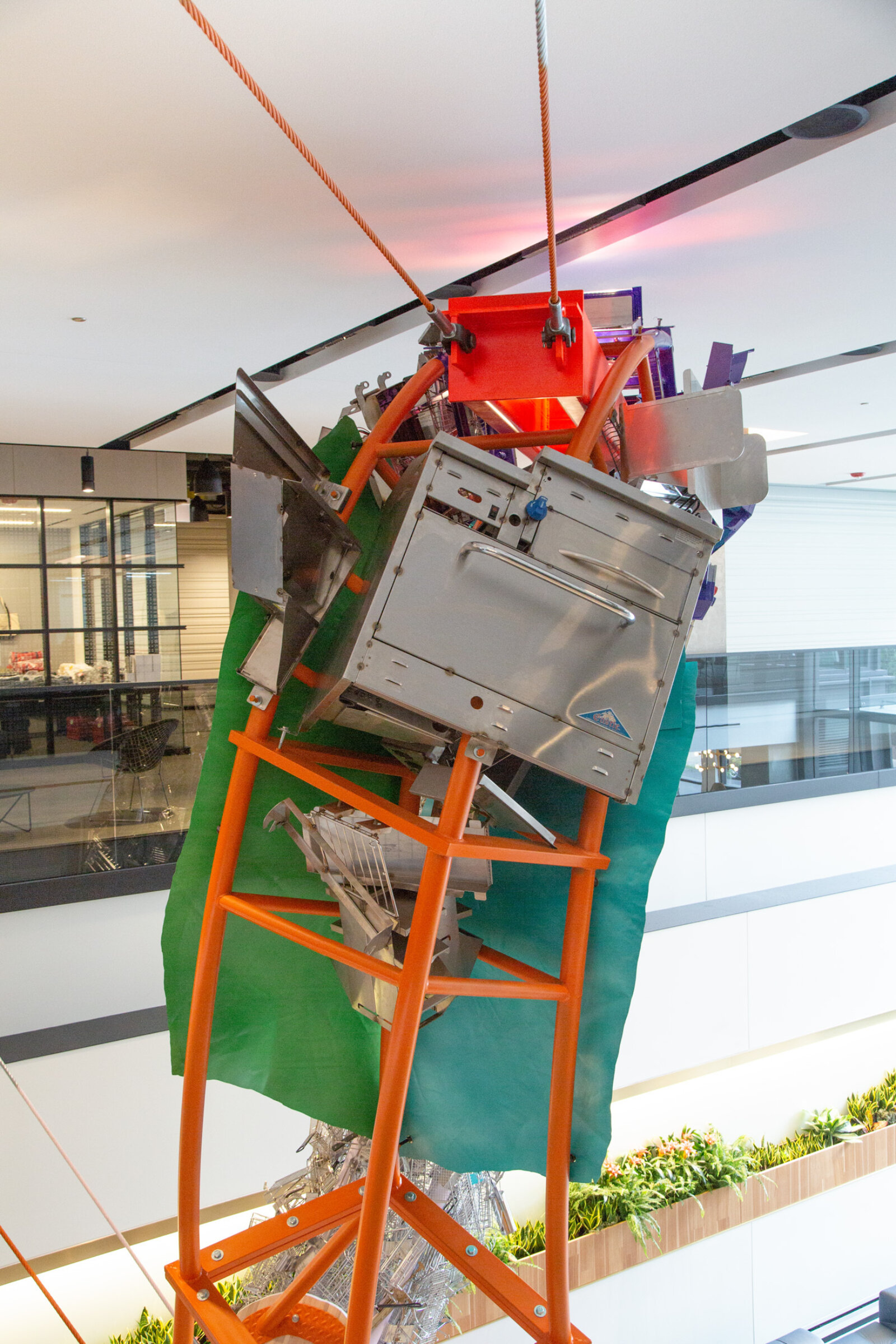 Jessica Stockholder, Cloud Storage (detail), 2018, metal, cable, hardware, machines from McDonald’s kitchens, 240 x 168 x 60 in. (610 x 427 x 152 cm). Installation view, McDonald’s Global Headquarters, Chicago, USA