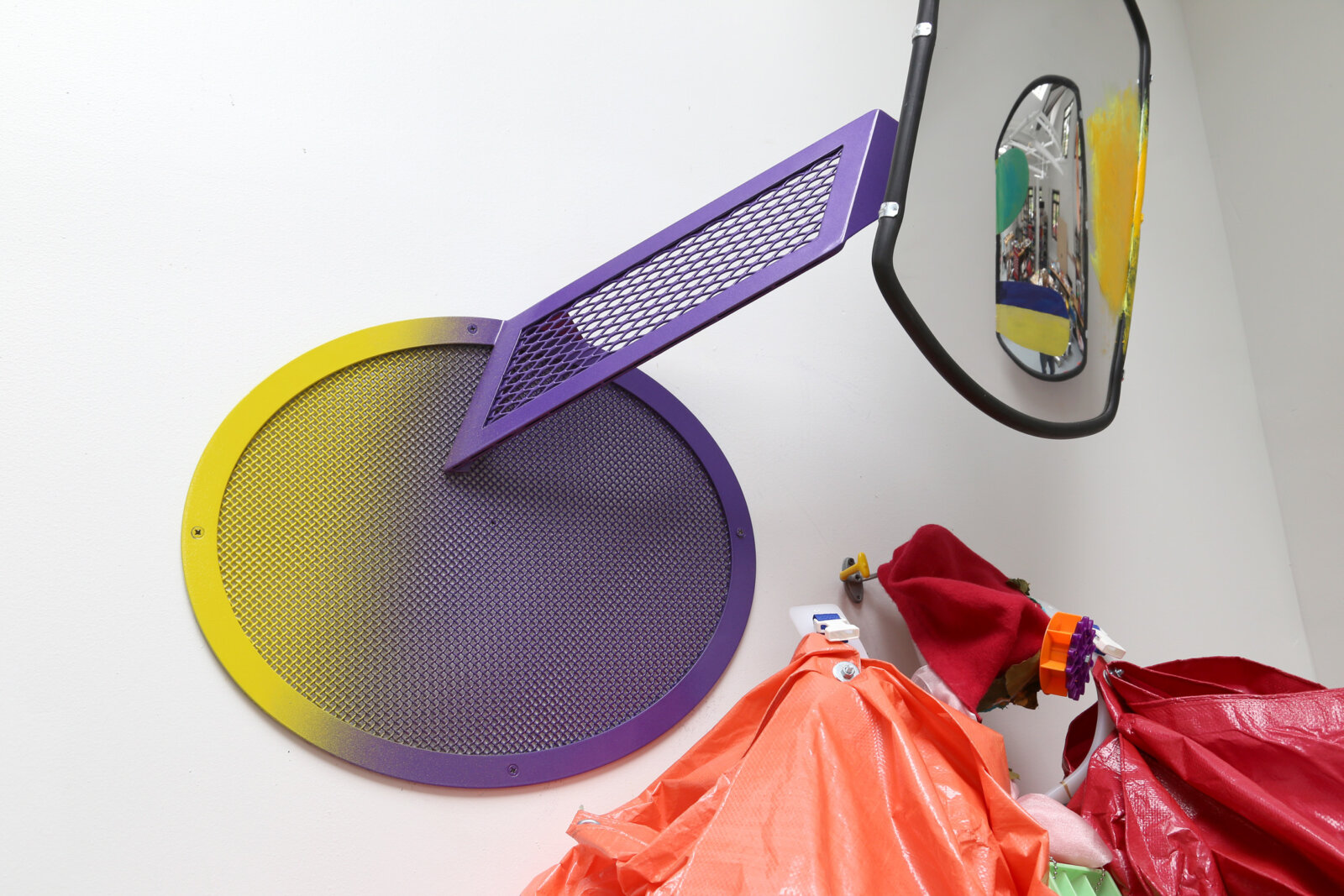 Jessica Stockholder, Curtsy in the Blind (detail), 2015, 2 driveway mirrors, custom hardware, 2 tarps, ice trays, plastic parts, fabric, acrylic paint, 110 x 60 x 24 in. (279 x 152 x 61 cm)
