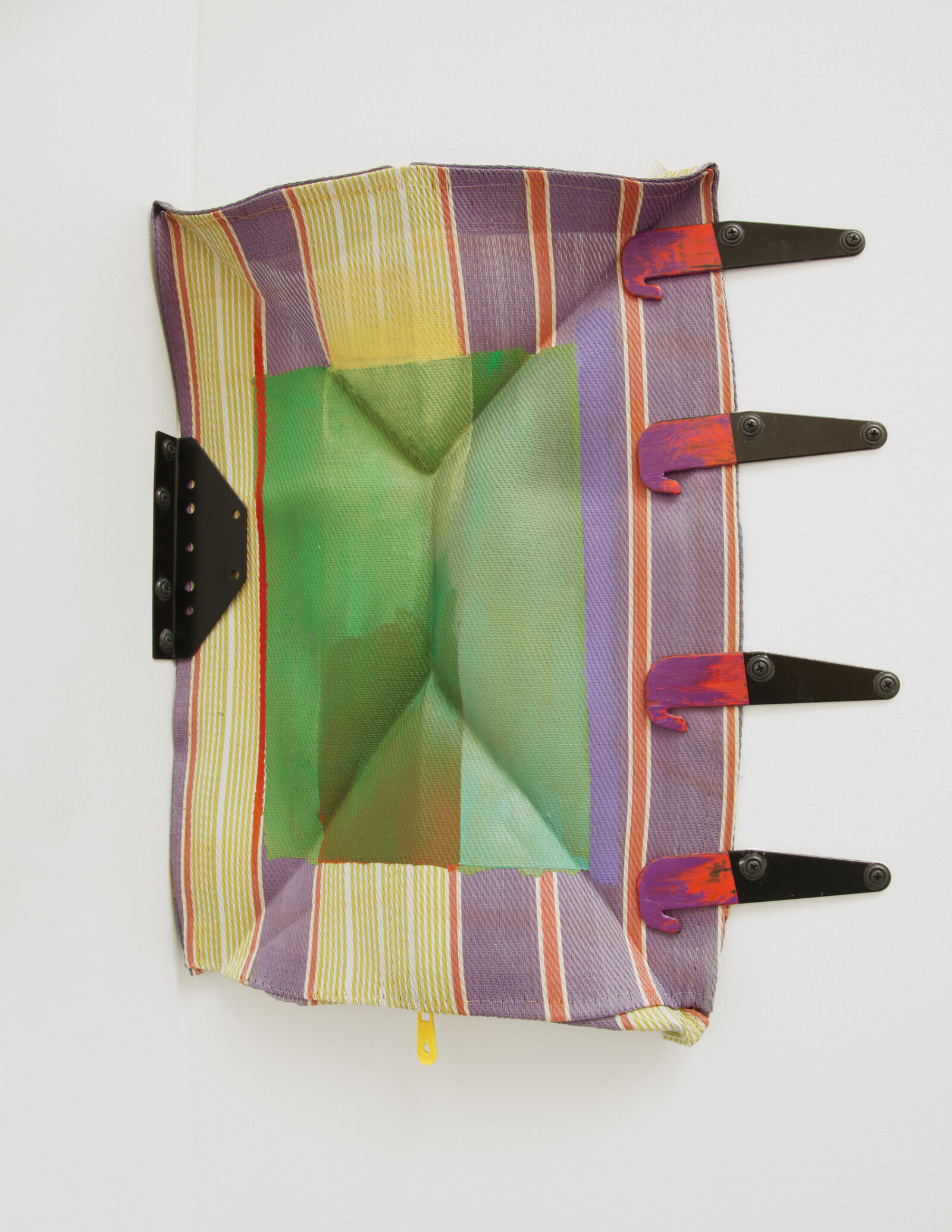 Jessica Stockholder, Human Stain – Stolen title, 2021, synthetic bag fragment, acrylic paint, hardware, 18 x 16 x 4 in. (46 x 39 x 9 cm)
