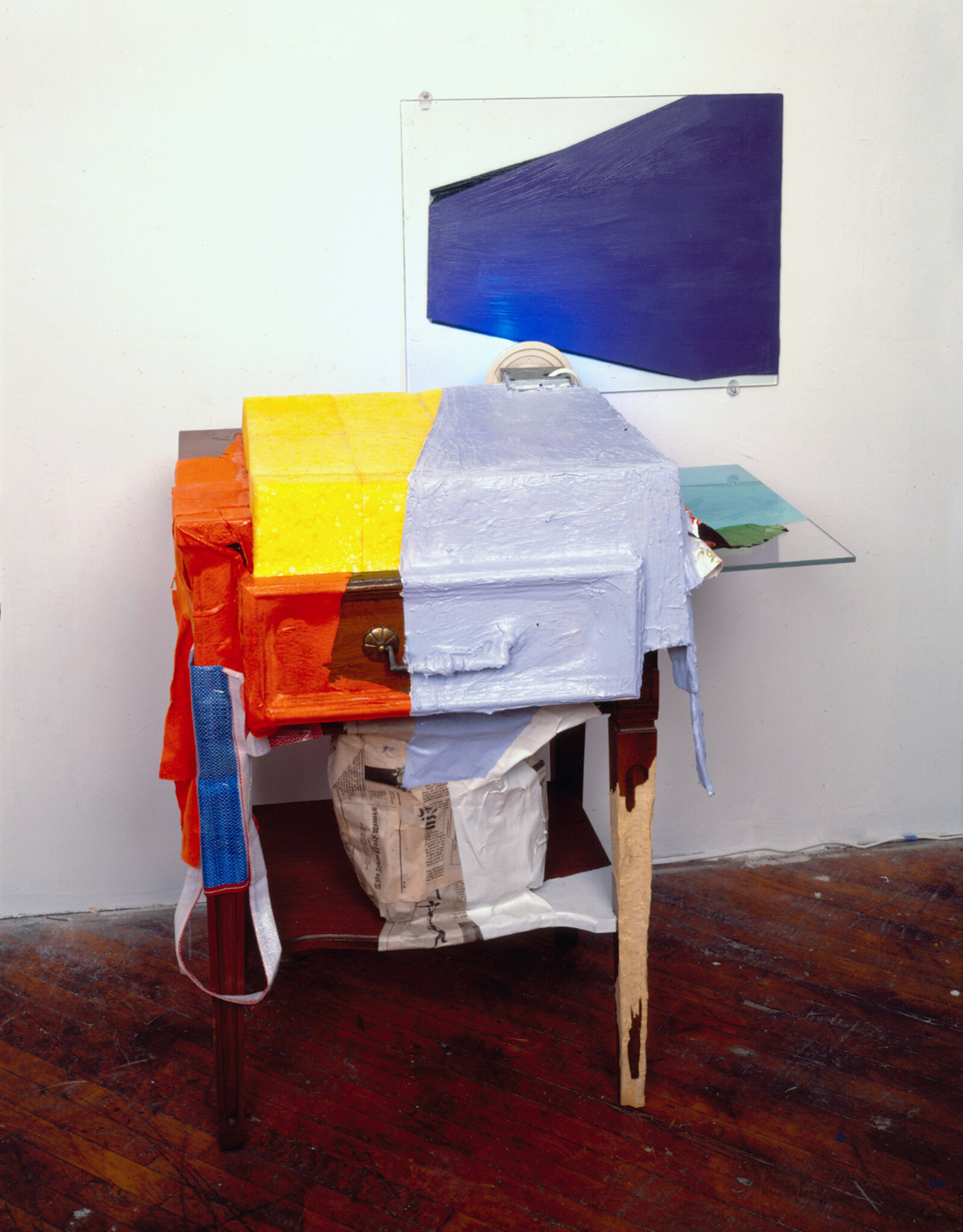 Jessica Stockholder, JS140, 1990, yellow sponges, plexiglas, furniture, paper maché, plastic, oil and acrylic paint, cloth, lamp, glass, 50 x 29 x 24 in. (127 x 74 x 61 cm)