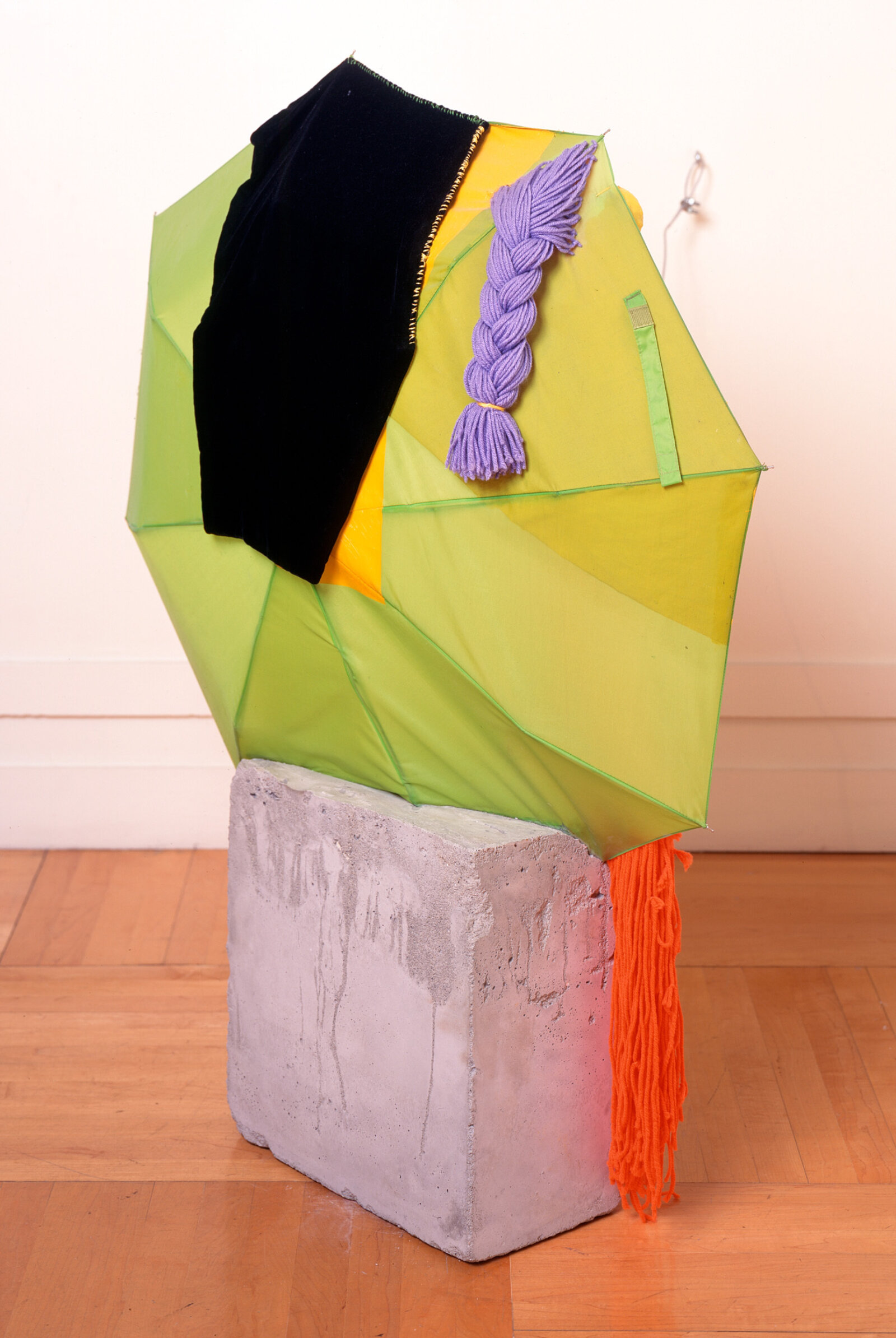 Jessica Stockholder, JS256, 1995, acrylic paint, cement, nylon umbrella, aluminum tubing, velvet, thread, acrylic yarn, eye hooks, clamps, plastic lemons, 43 x 34 x 13 in. (109 x 86 x 32 cm)