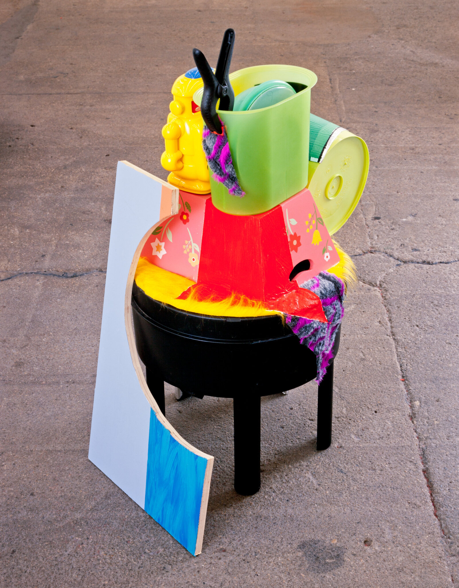 Jessica Stockholder, JS368, 2003, plastic composting base, plastic containers, wooden box, plywood, plastic clamp, fabric, fake fur, aluminium/tar flashing, plastic robot toy, acrylic and oil paint, 43 x 20 x 27 in. (108 x 51 x 69 cm)